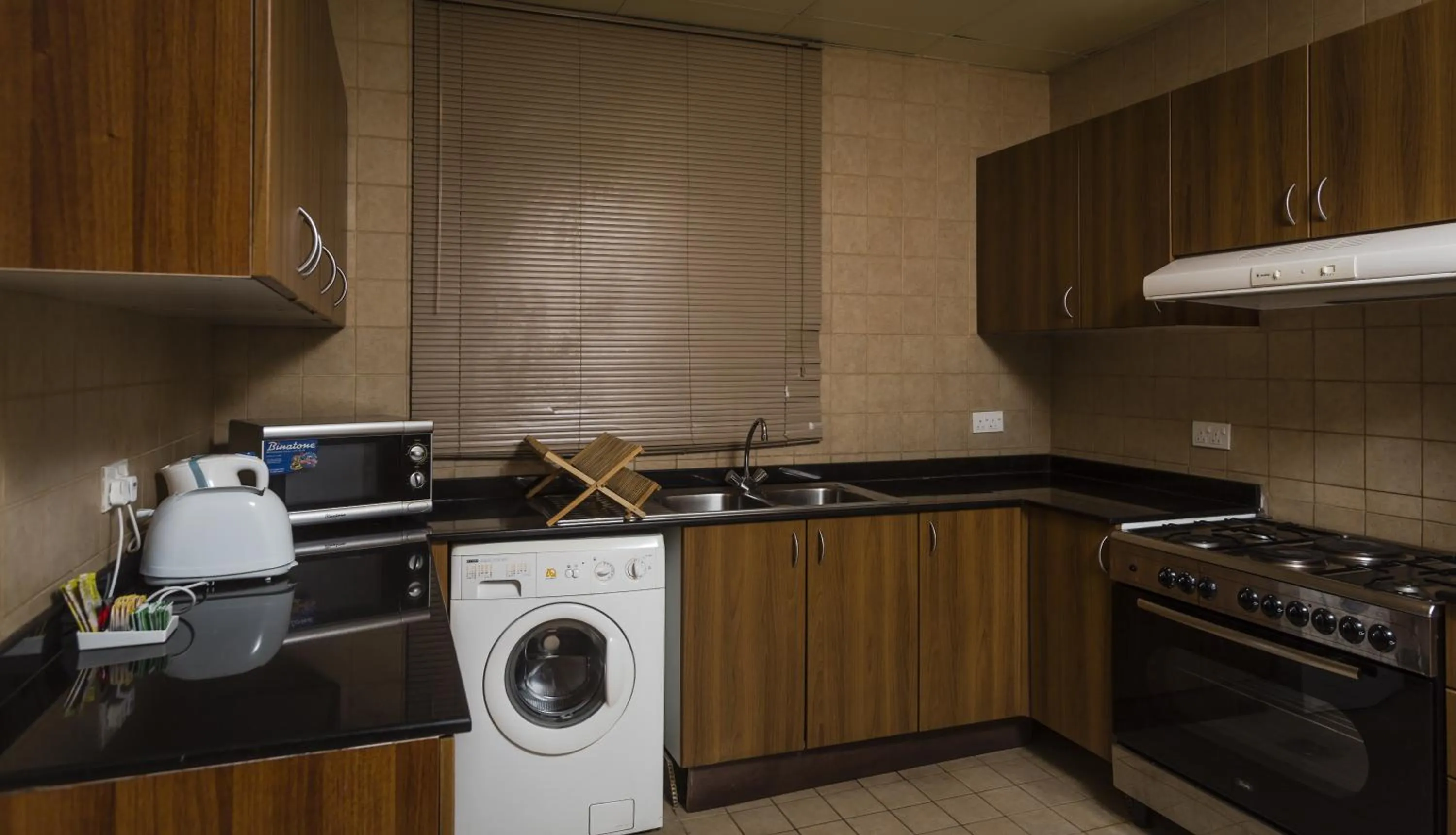 Kitchen or kitchenette in Arabian Dreams Hotel Apartments