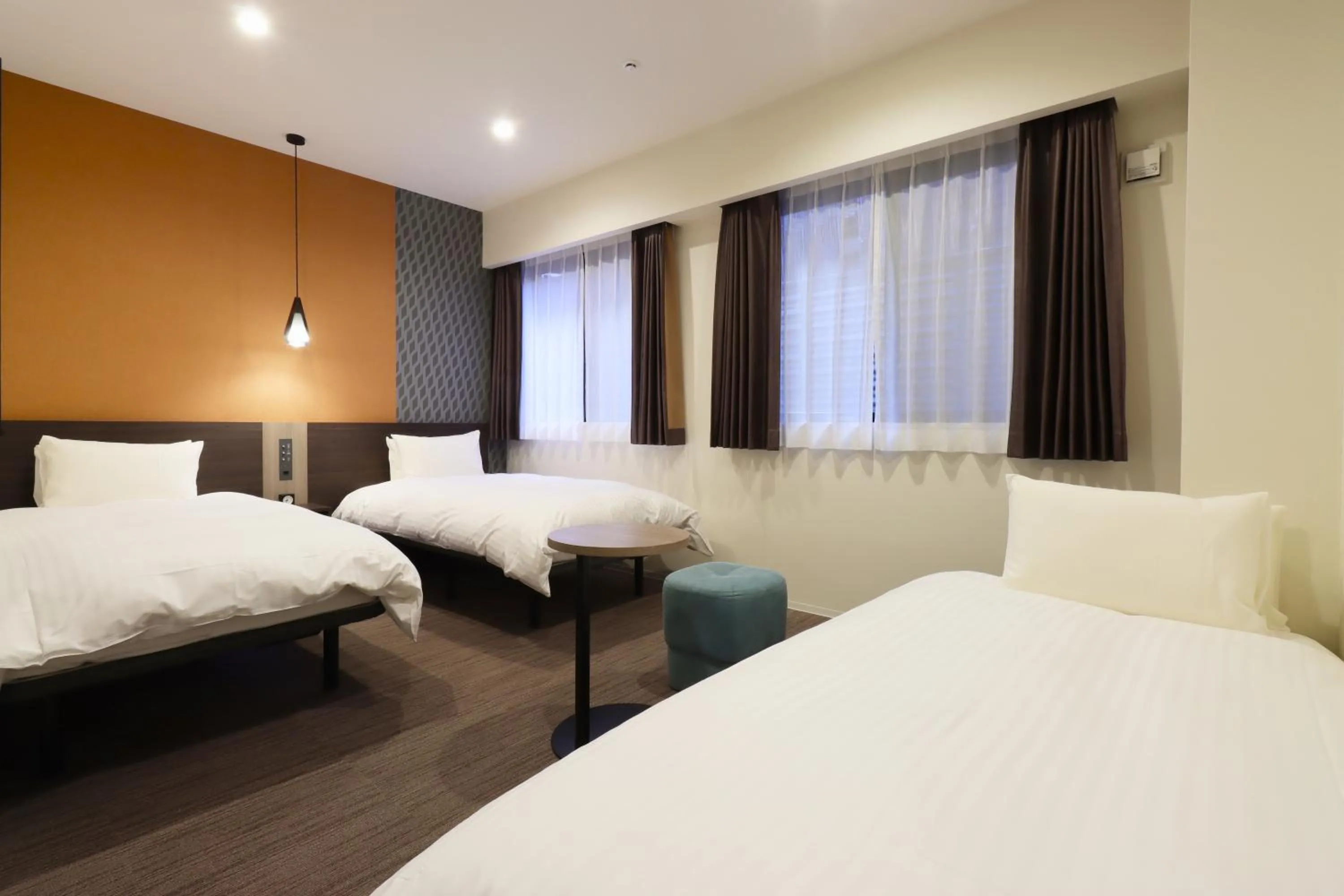 Bed in Wander Kyoto Nanajo