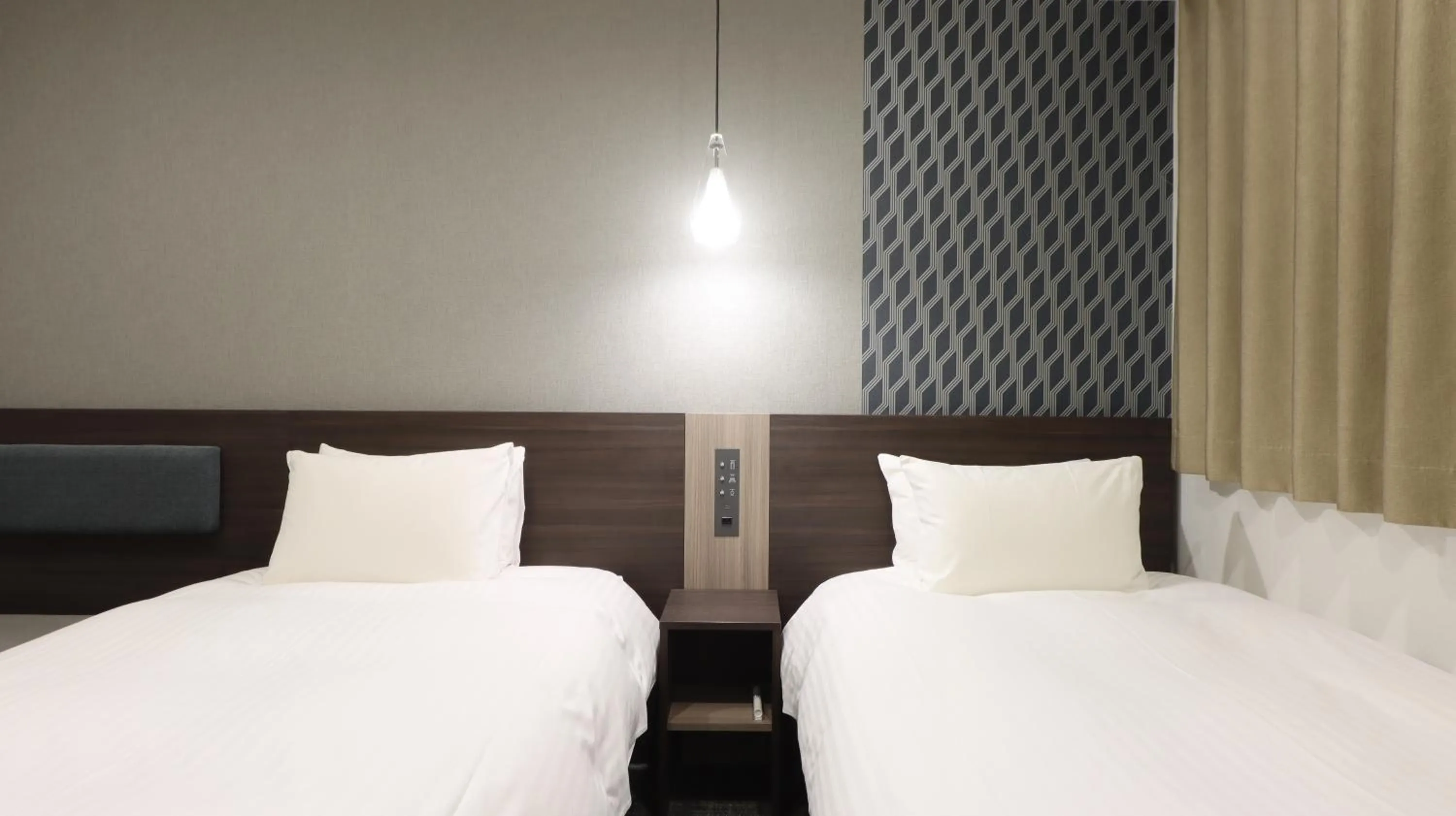 Bed in Wander Kyoto Nanajo