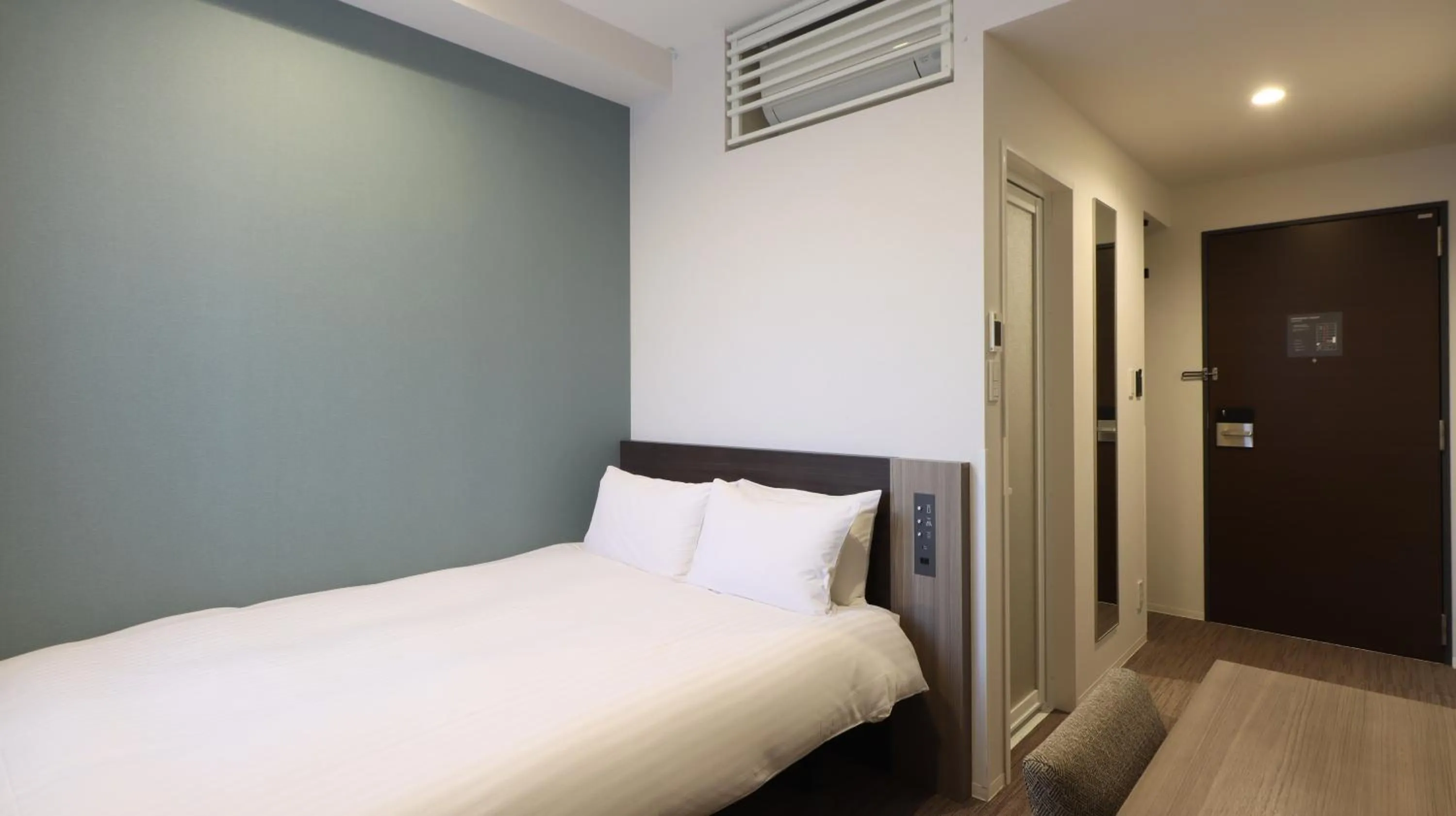 Bed in Wander Kyoto Nanajo