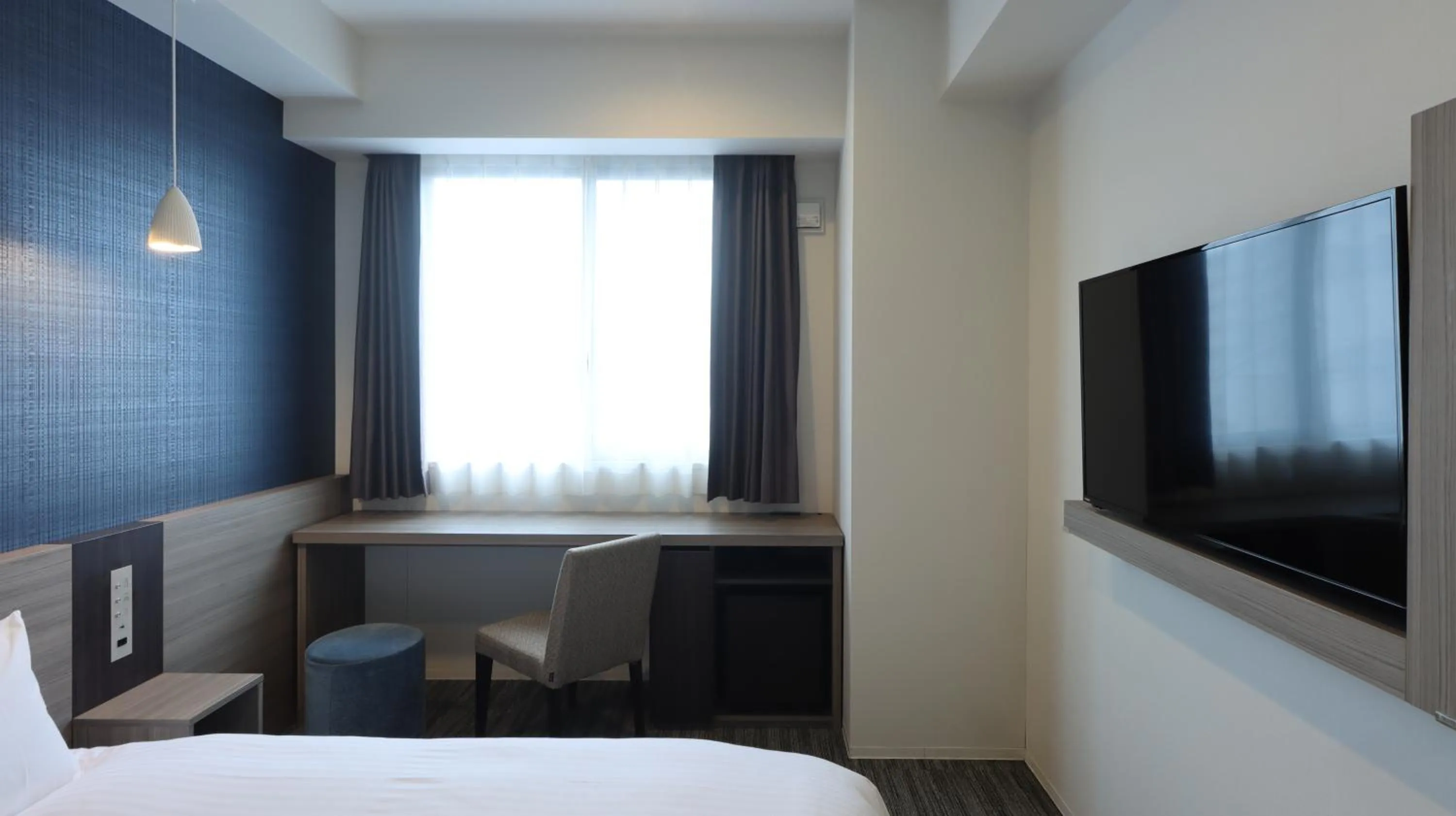 Bed in Wander Kyoto Nanajo