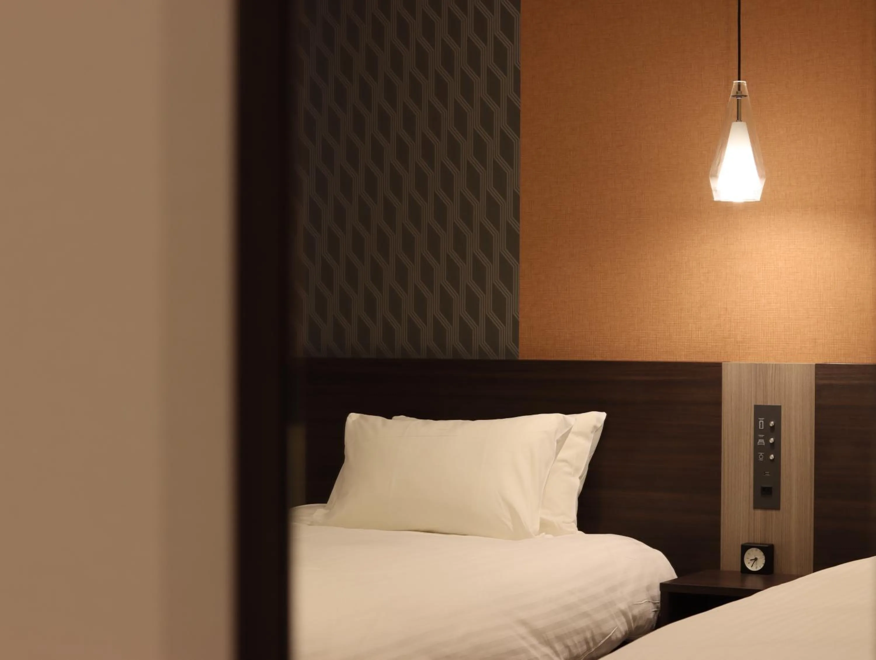 Bed in Wander Kyoto Nanajo