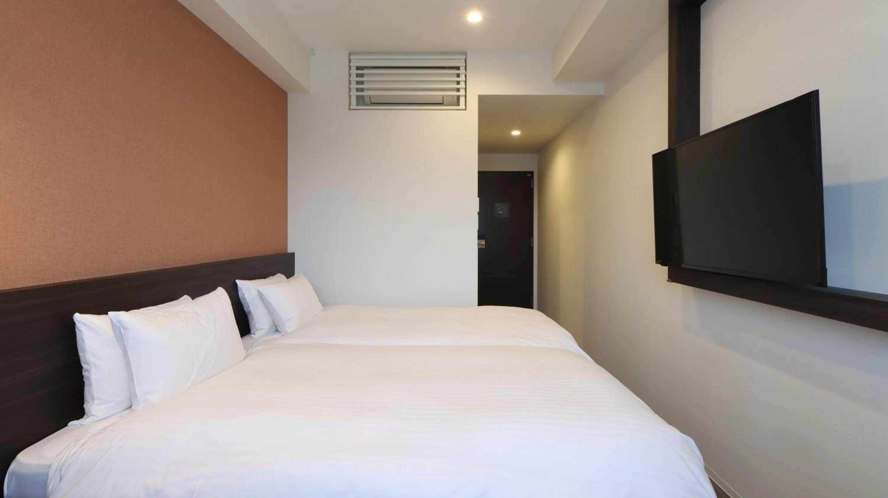 Bed in Wander Kyoto Nanajo