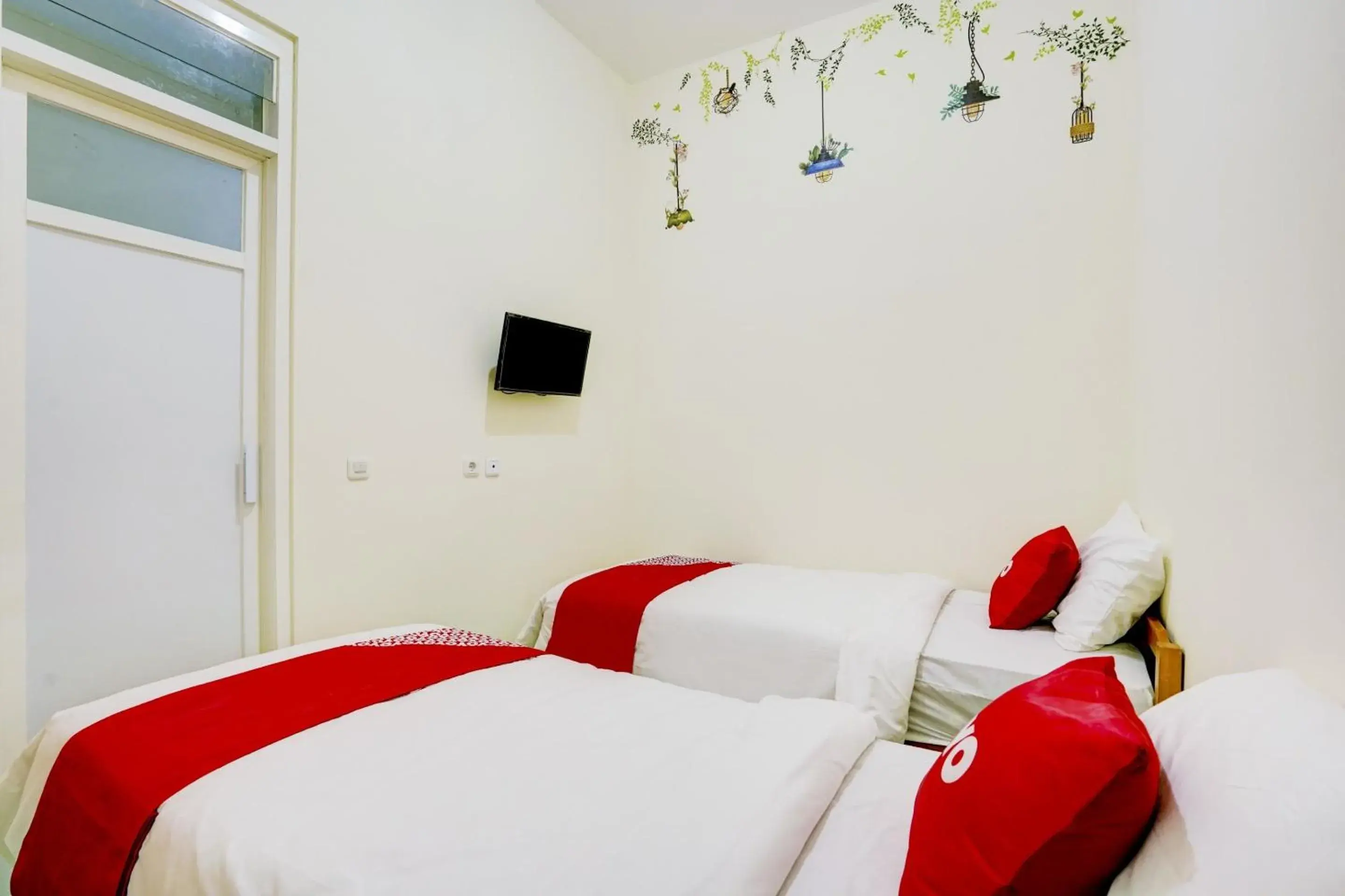 Bedroom, Bed in Capital O Inn App Tenggilis Bedroom, Bed in Capital O Inn App Tenggilis