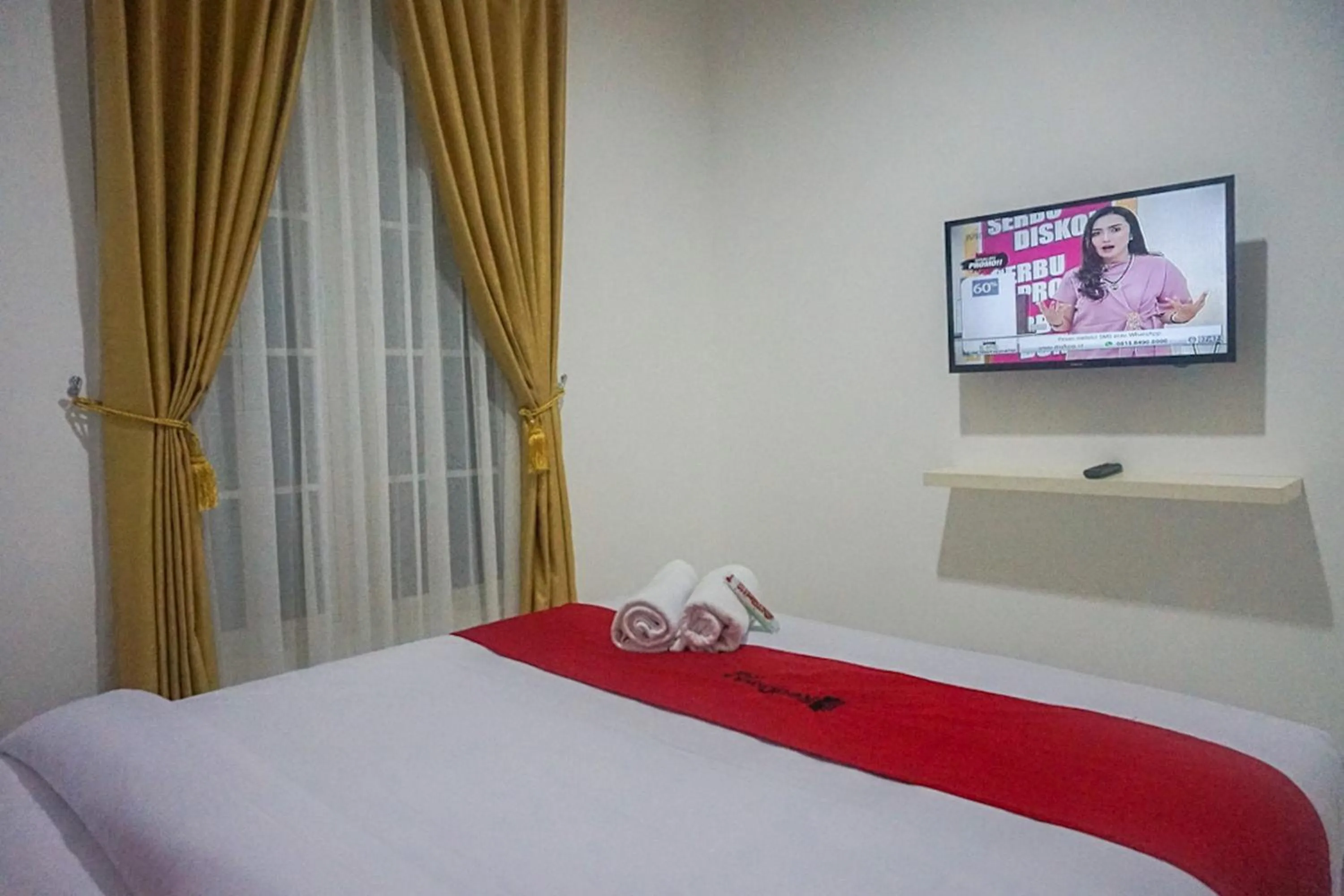 Bed in RedDoorz near Araya Family Club House
