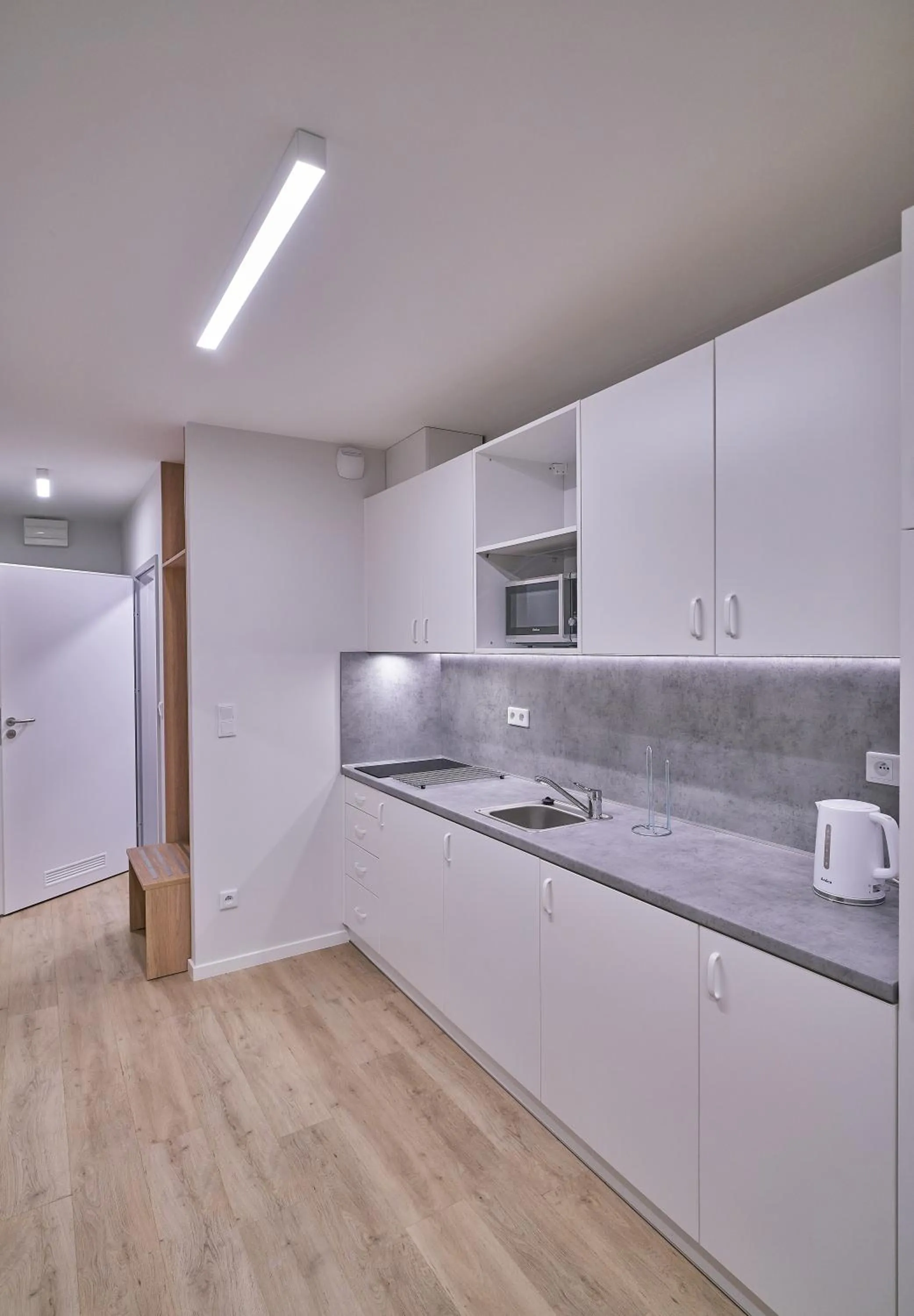 Kitchen or kitchenette in Apartamenty Collegia