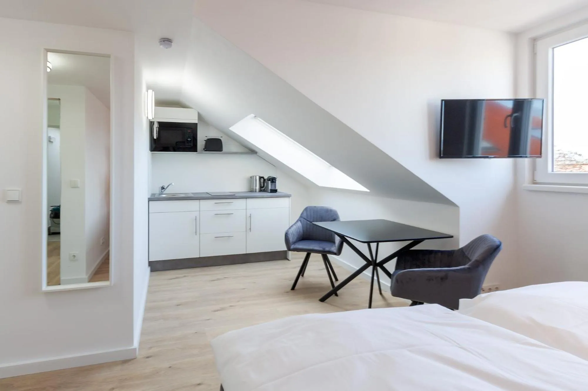 TV and multimedia, Bed in STAY@MA Boardinghouse Mannheim