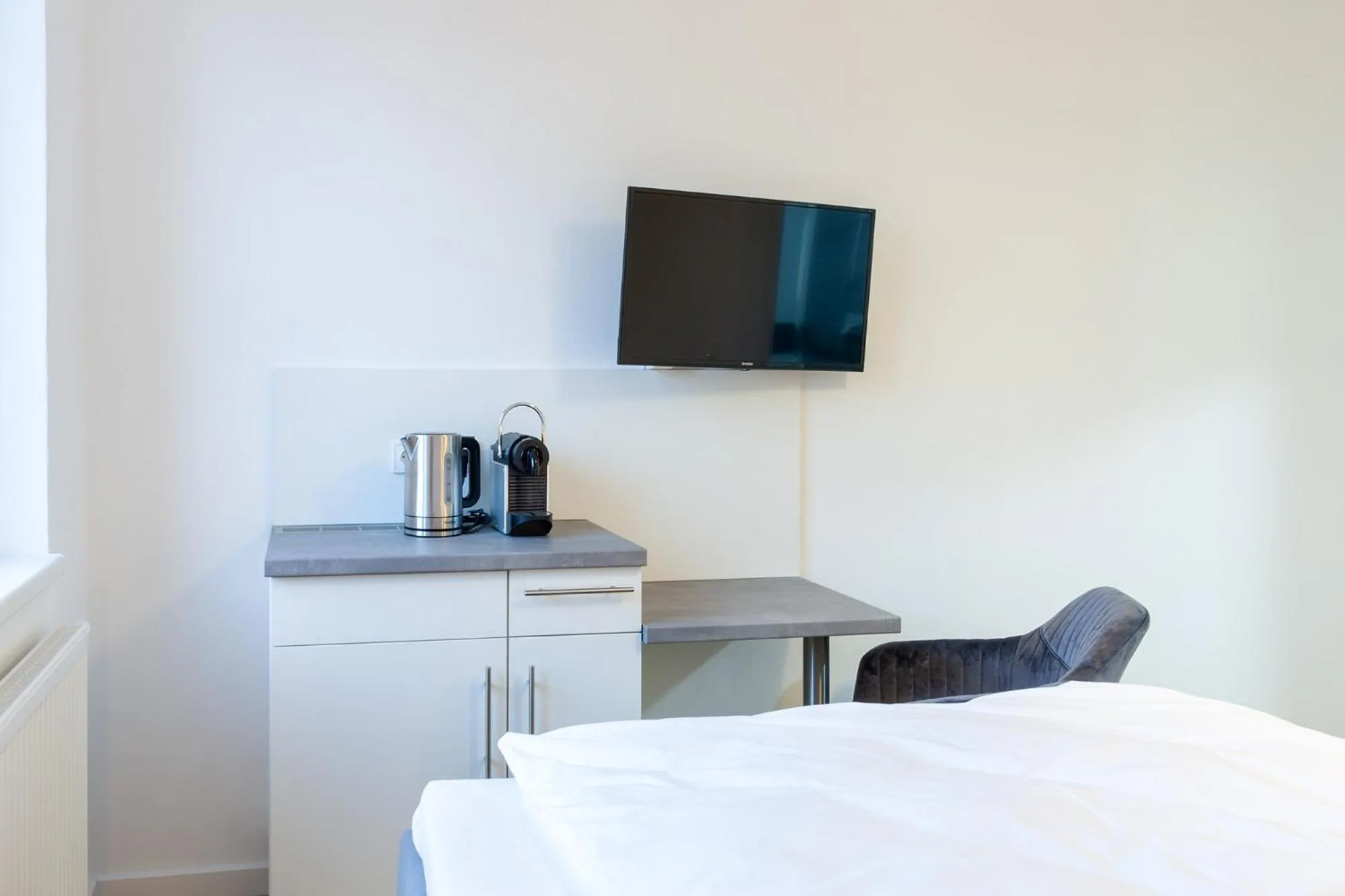 TV and multimedia, Bed in STAY@MA Boardinghouse Mannheim