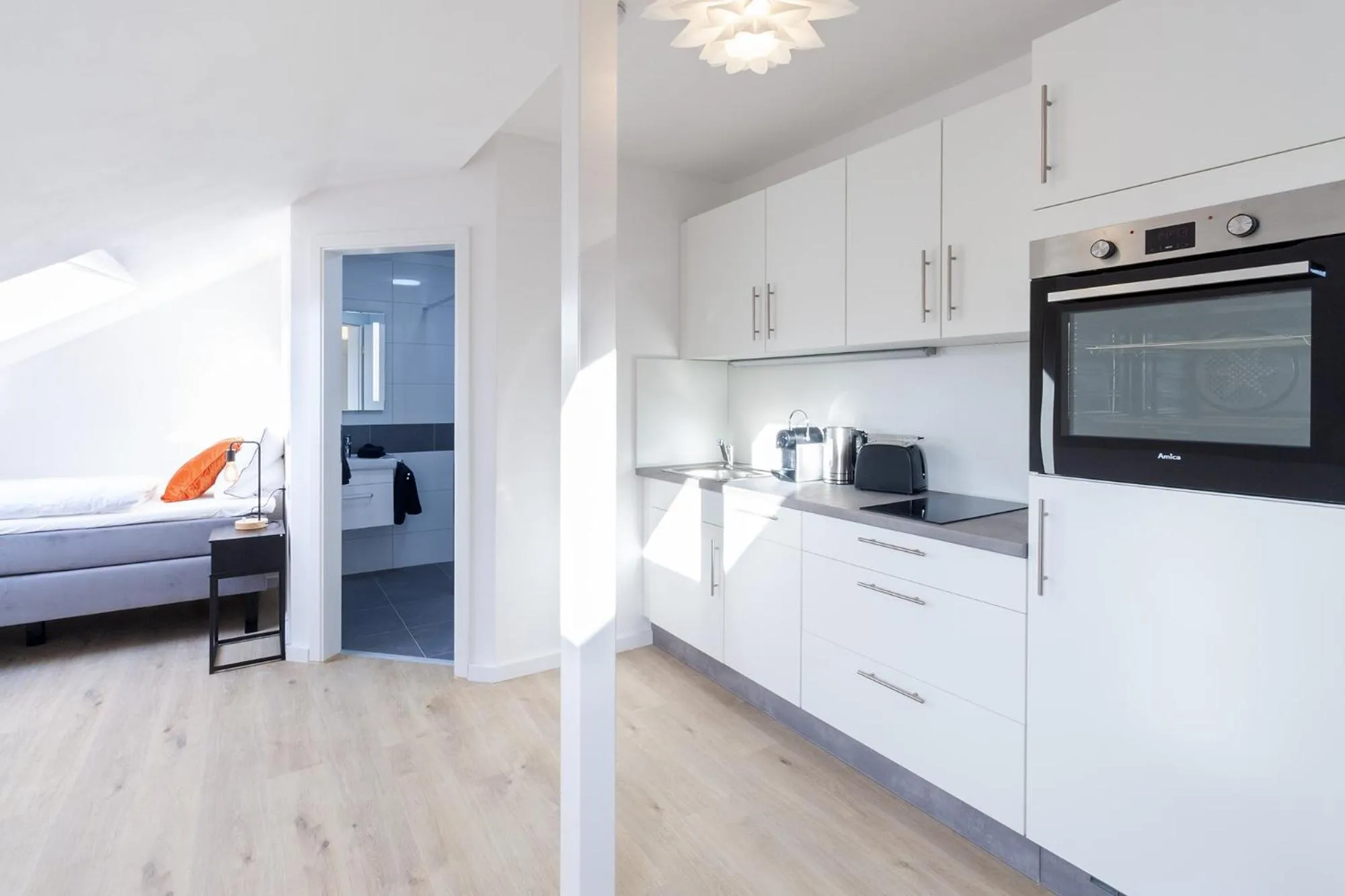 Kitchen or kitchenette, Bed in STAY@MA Boardinghouse Mannheim