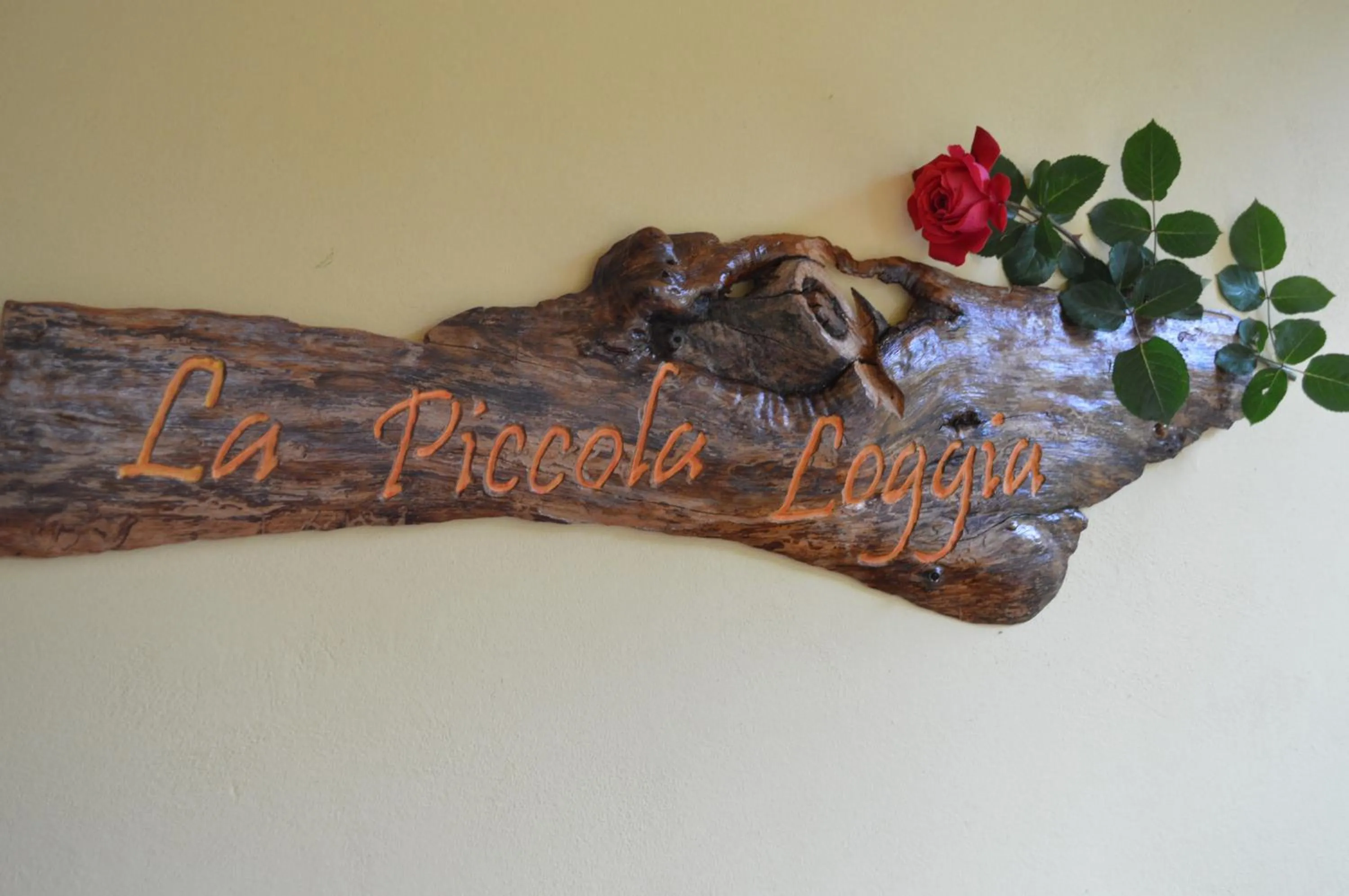Property logo or sign in La Piccola Loggia