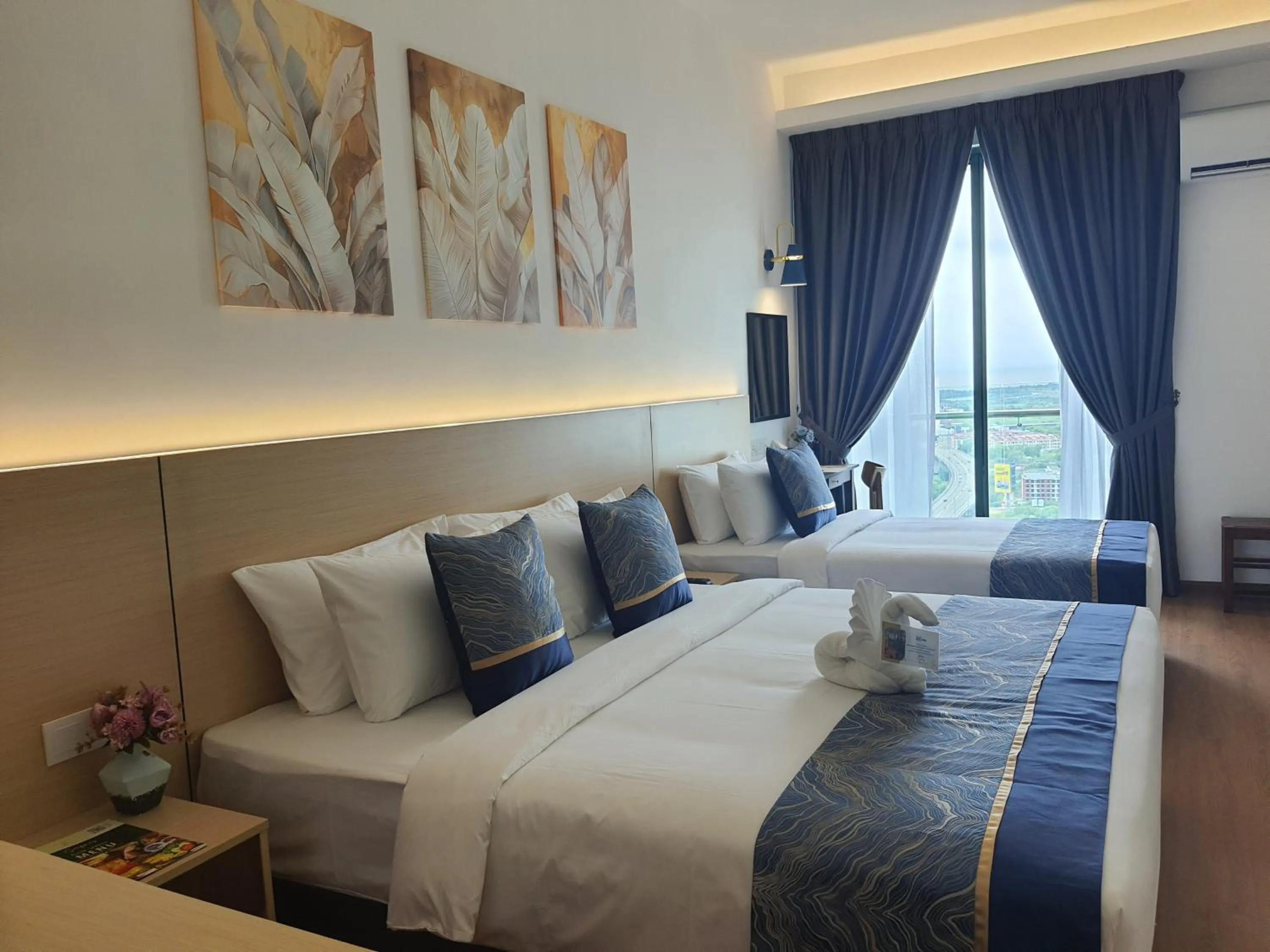 Bed in Swan Garden Resort Hotel