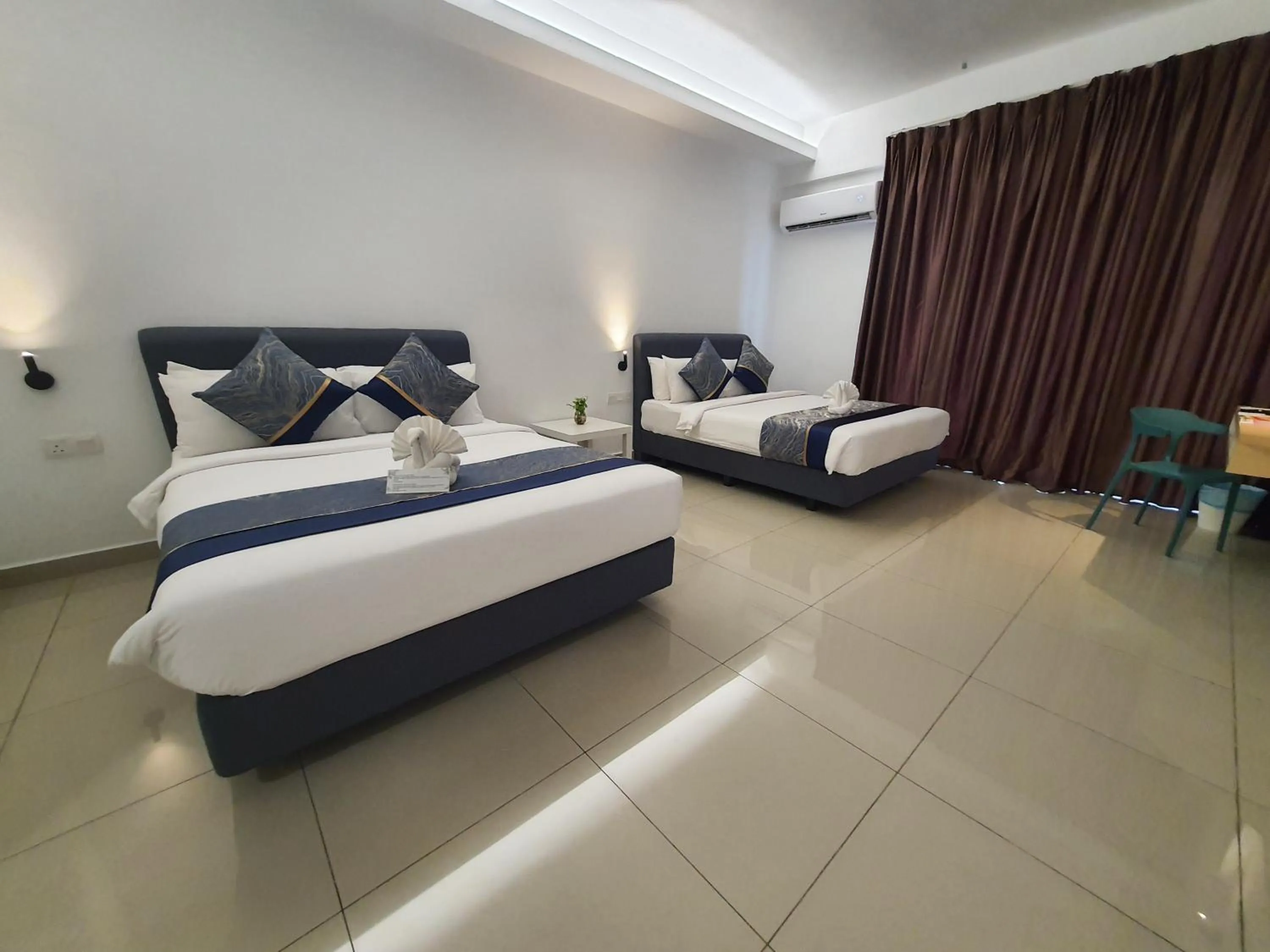 Bed in Swan Garden Resort Hotel