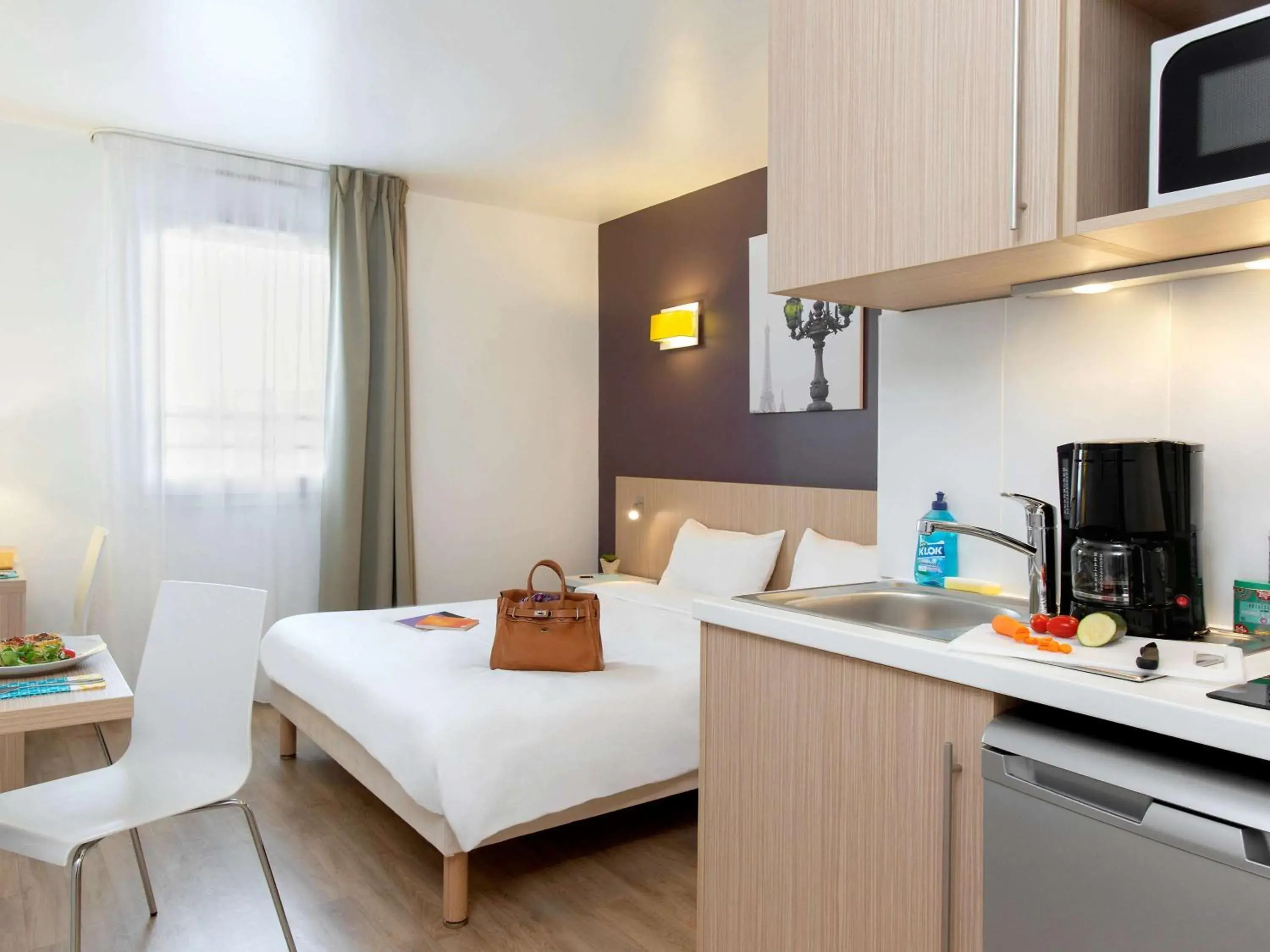 Photo of the whole room, Bed in Aparthotel Adagio Access Paris Clichy Photo of the whole room, Bed in Aparthotel Adagio Access Paris Clichy