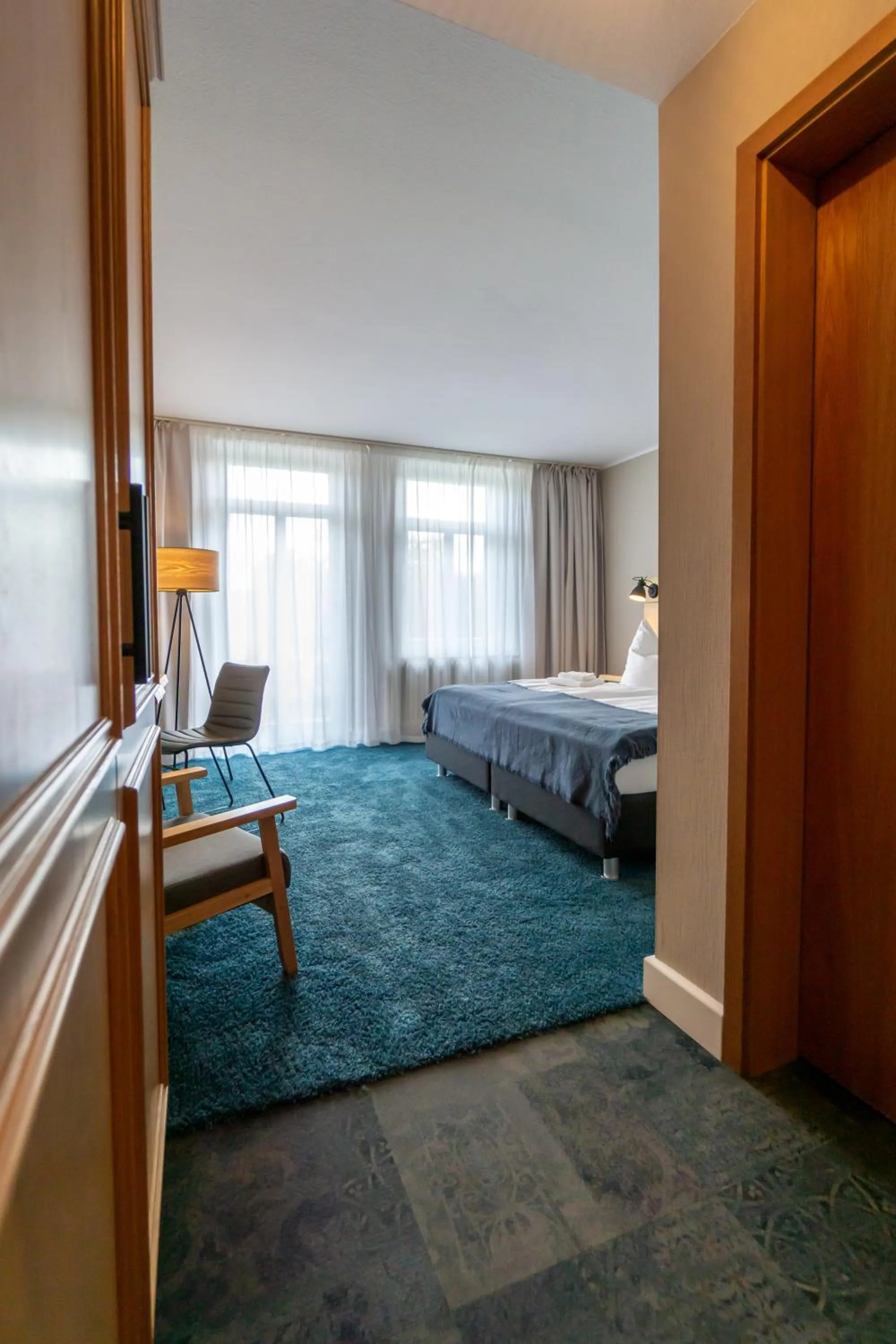 Photo of the whole room, Bed in Waldhotel Eiche