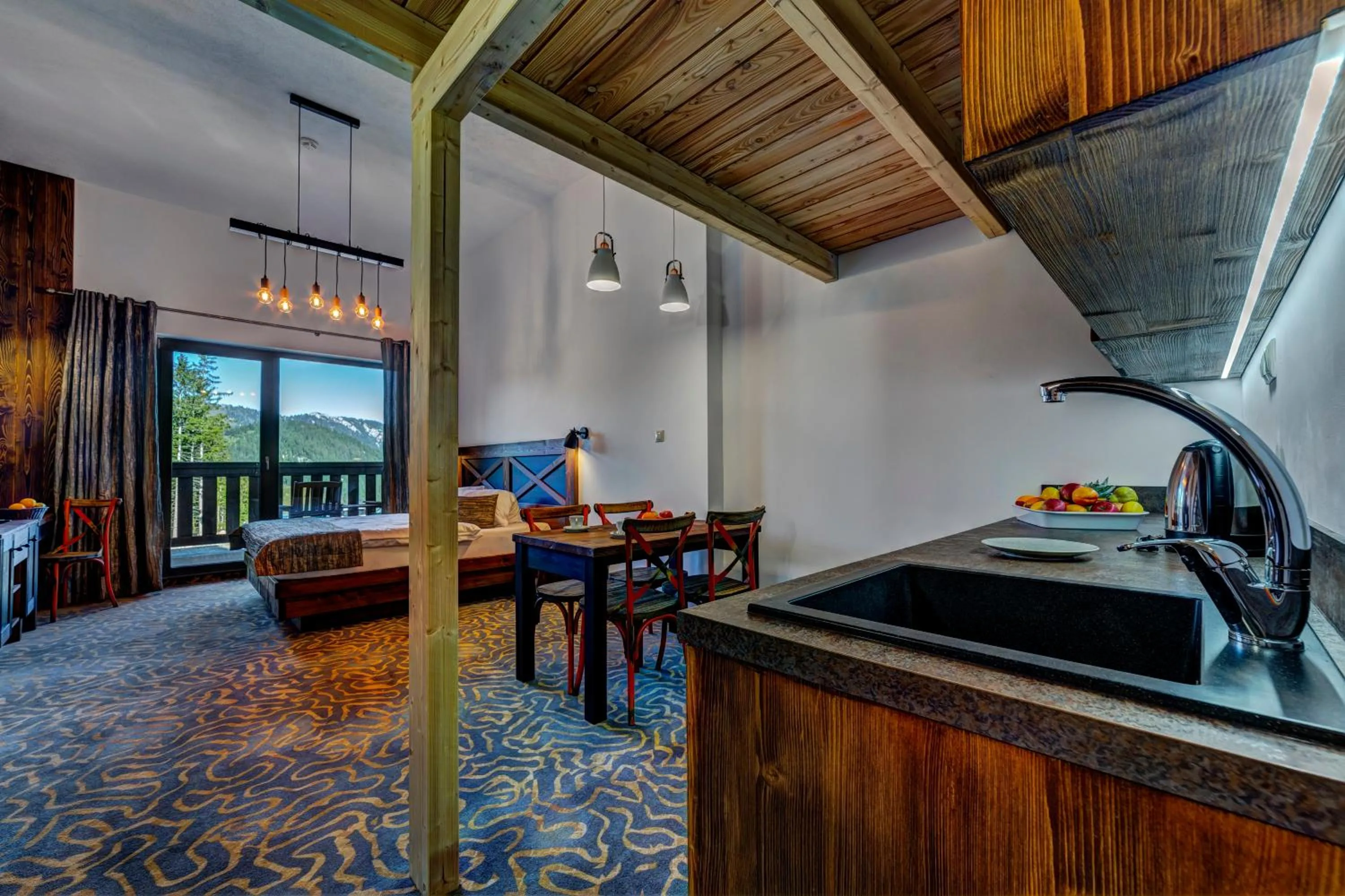 Kitchen or kitchenette in Hotel Strachan Family Jasná