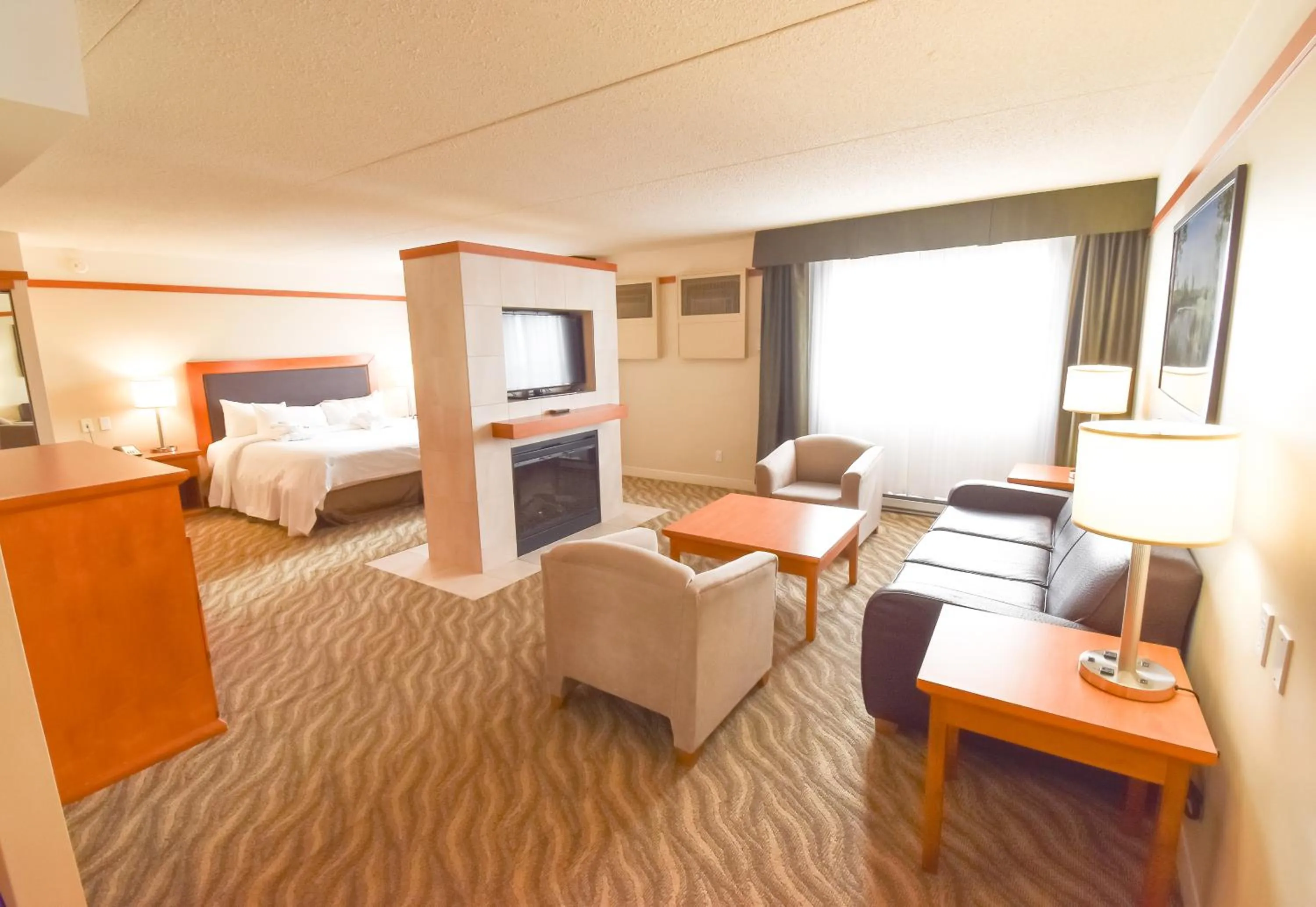 Seating area, Bed in Canad Inns Destination Centre Polo Park