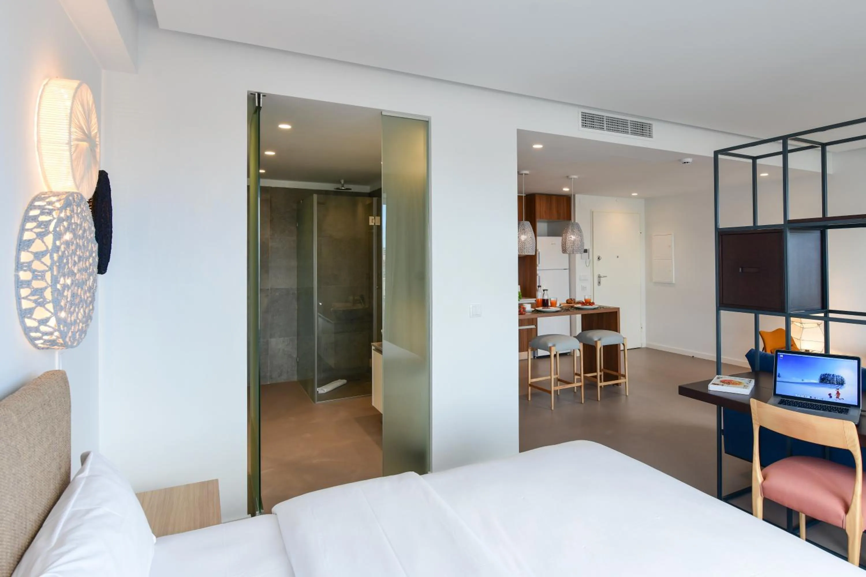 Bed in Oscar Concept Apartments