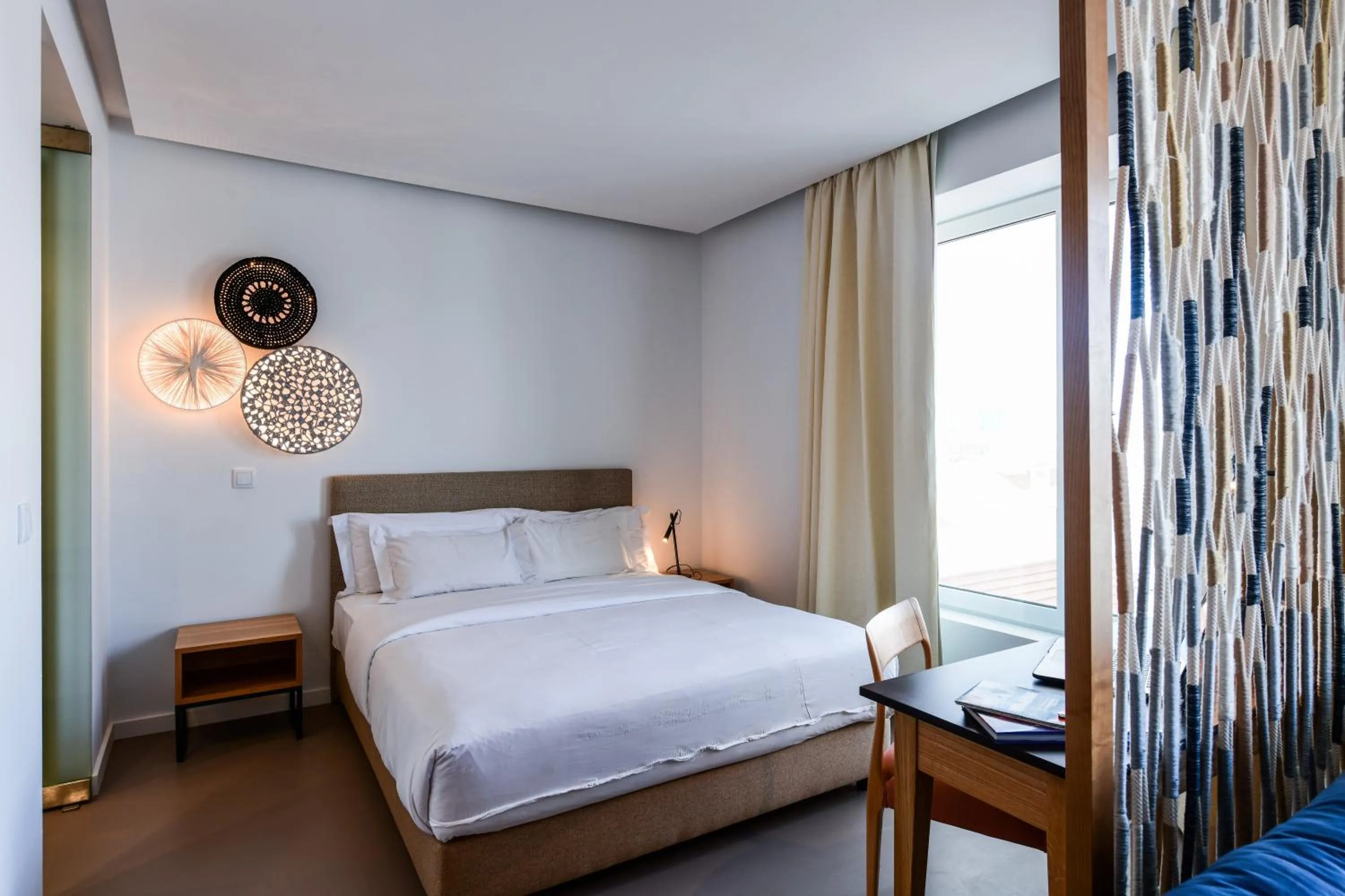 Bed in Oscar Concept Apartments