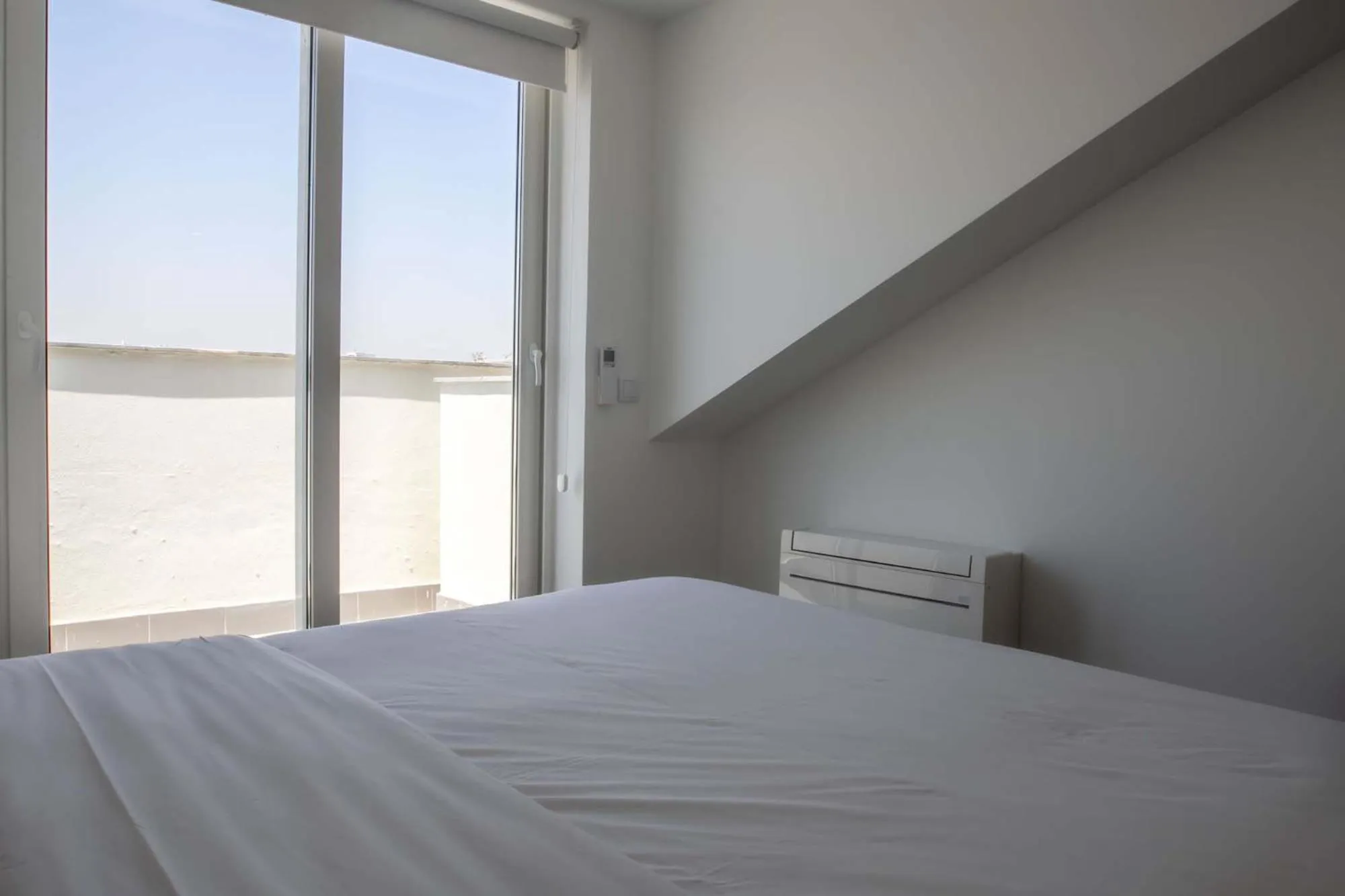 Bed in Oscar Concept Apartments