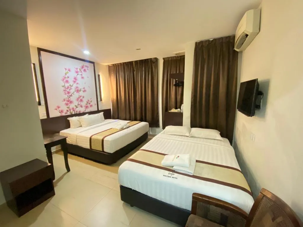 Bed in D&F BOUTIQUE HOTEL SENAWANG