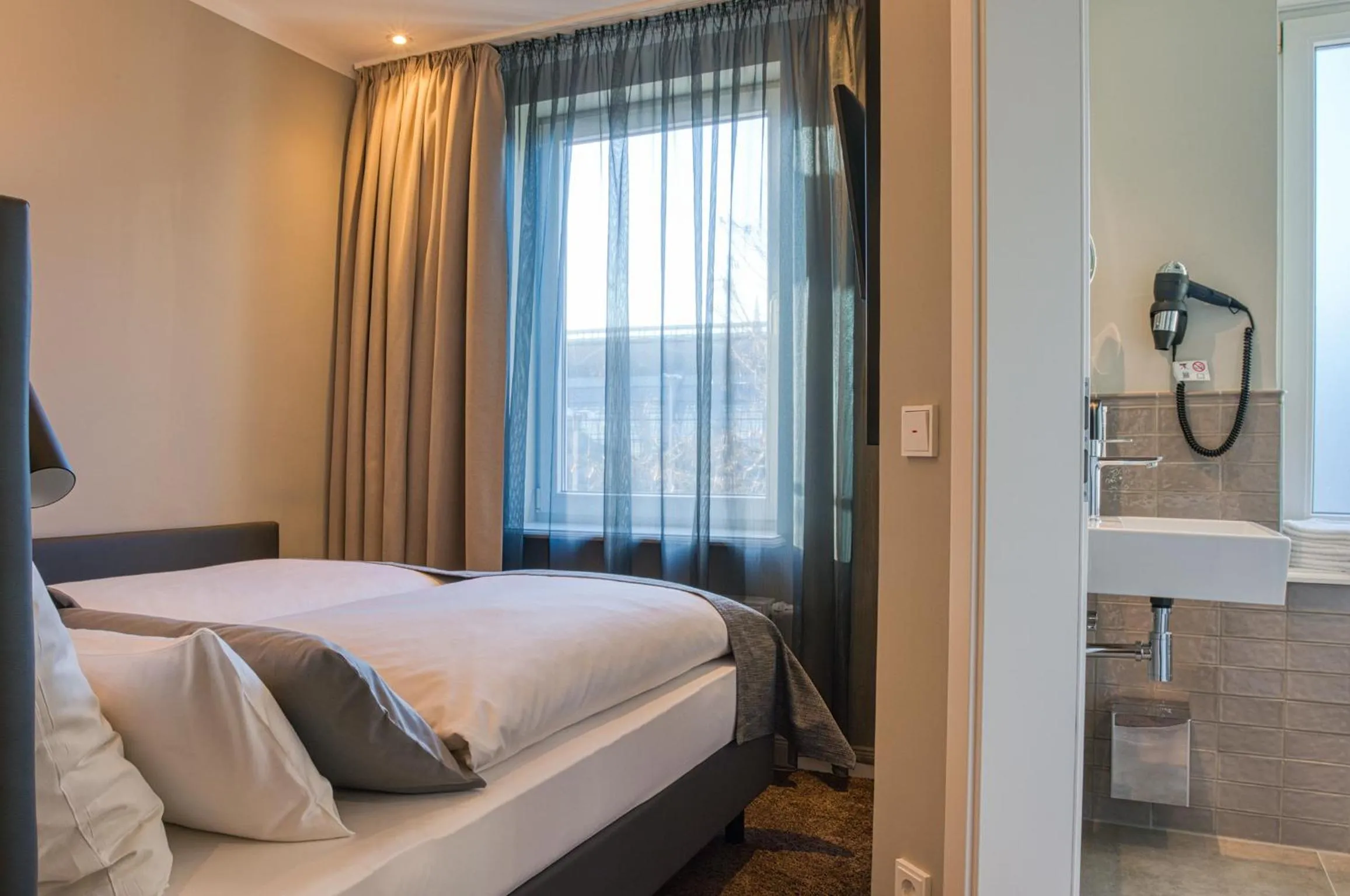 Photo of the whole room, Bed in Boutique 53 & 56 Hamburg City, Trademark Collection by Wyndham