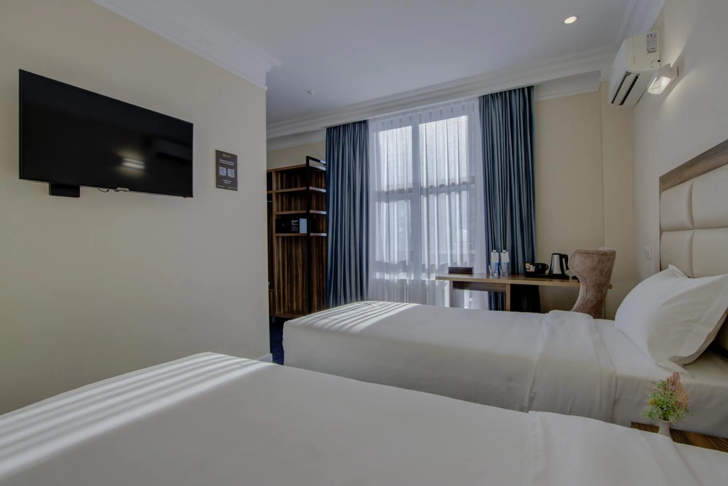 Bed in Hotel Resident Bishkek