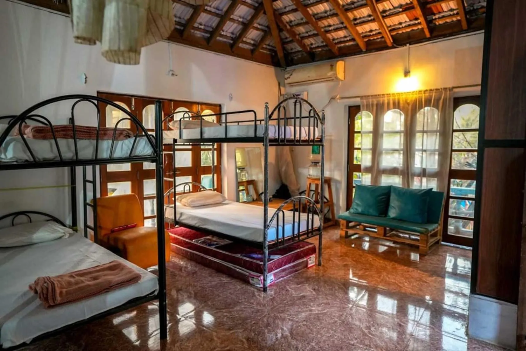 Seating area, Bed in Anjoned Hostel & Cafe