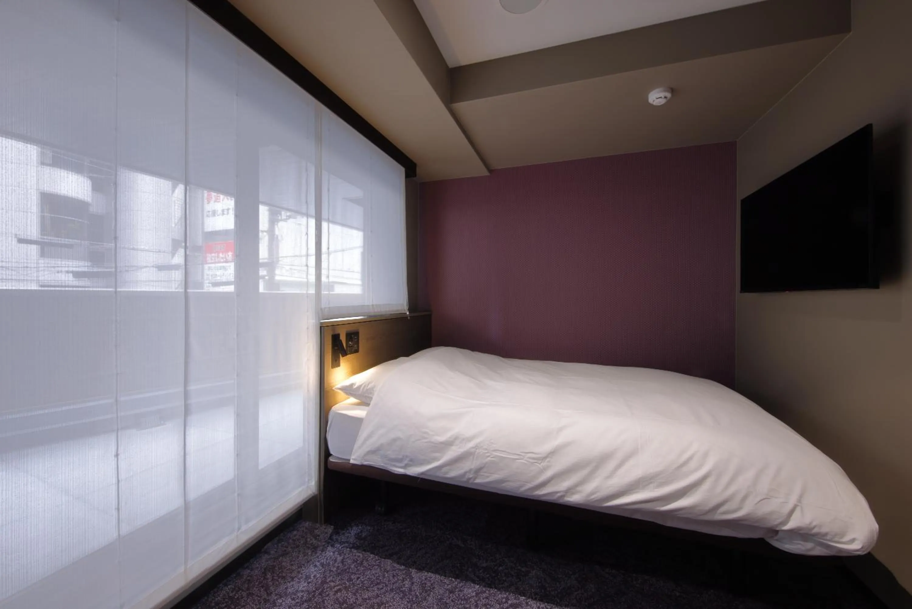 Photo of the whole room, Bed in Hotel SUI Kobe Sannomiya by ABEST