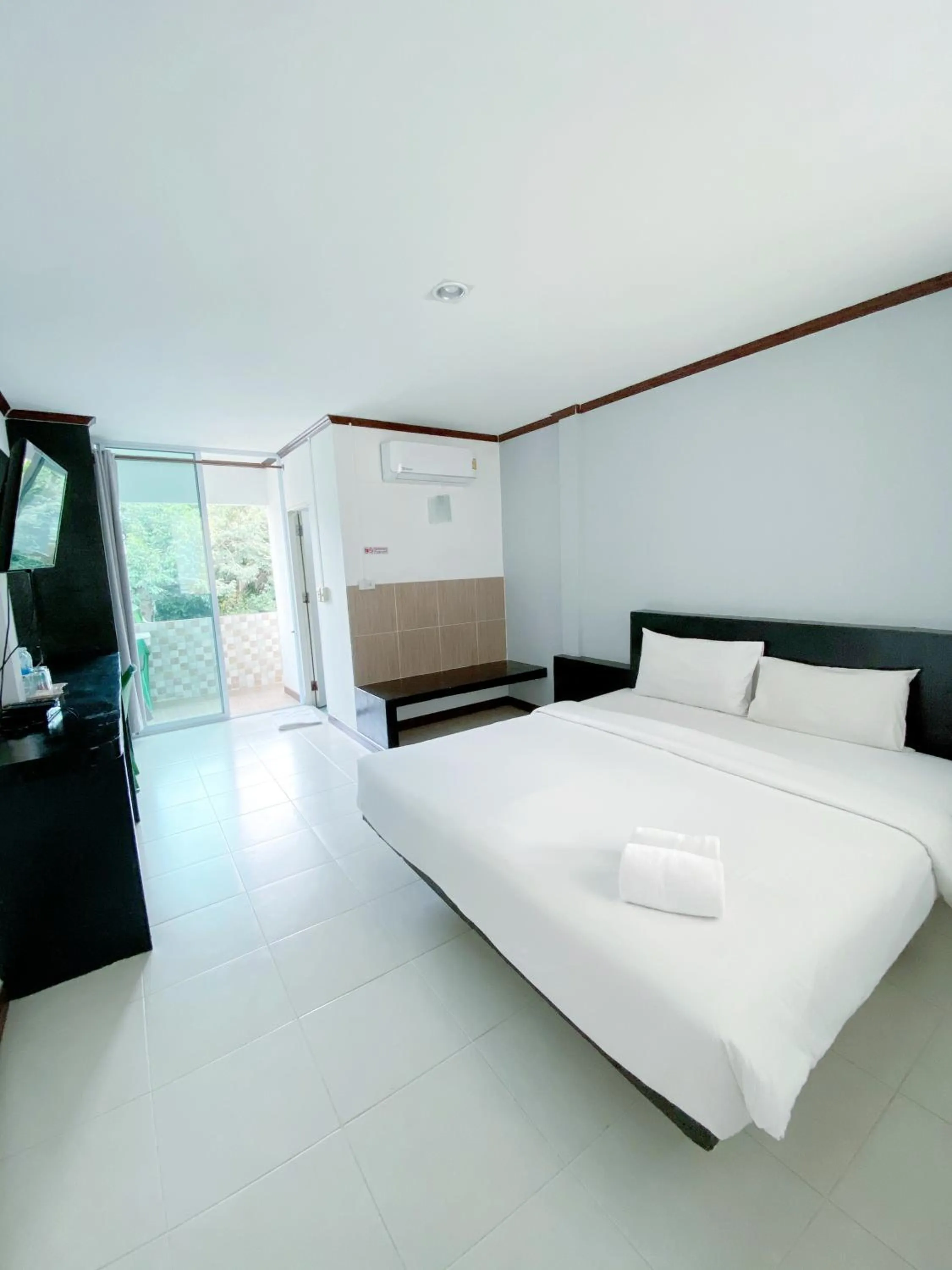 Bed in Tanatnan Hotel