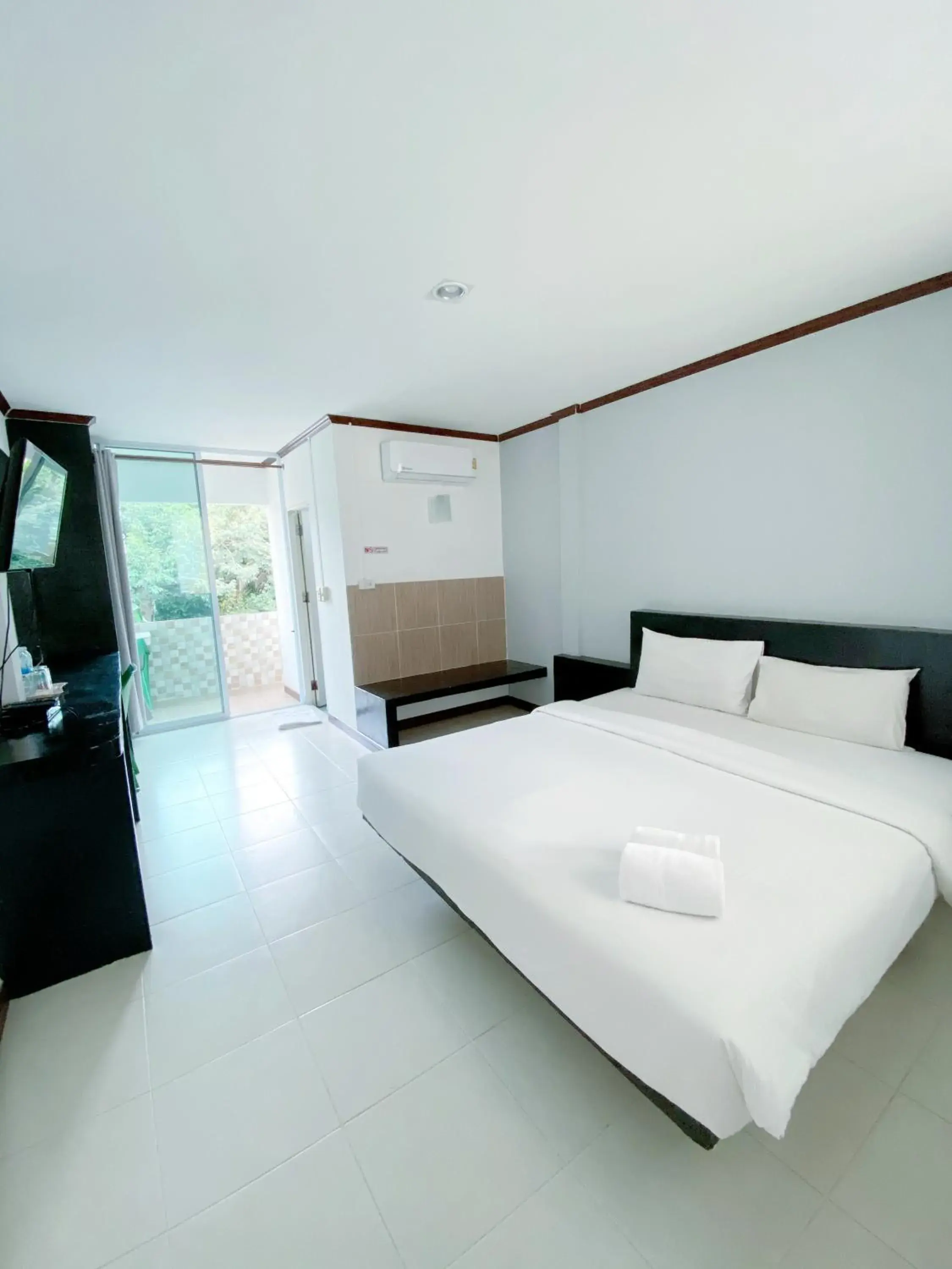 Bed in Tanatnan Hotel Bed in Tanatnan Hotel