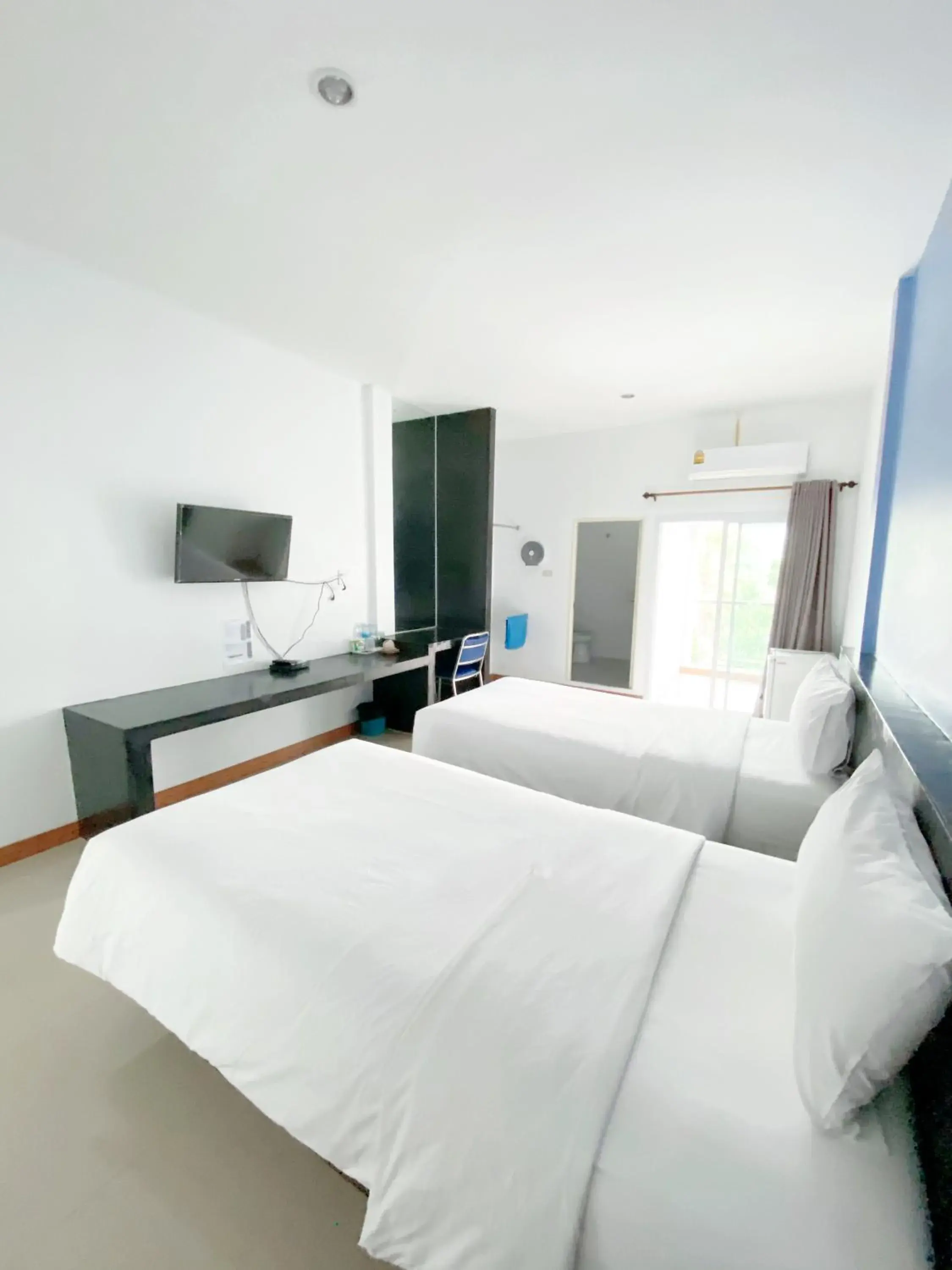 Bed in Tanatnan Hotel Bed in Tanatnan Hotel