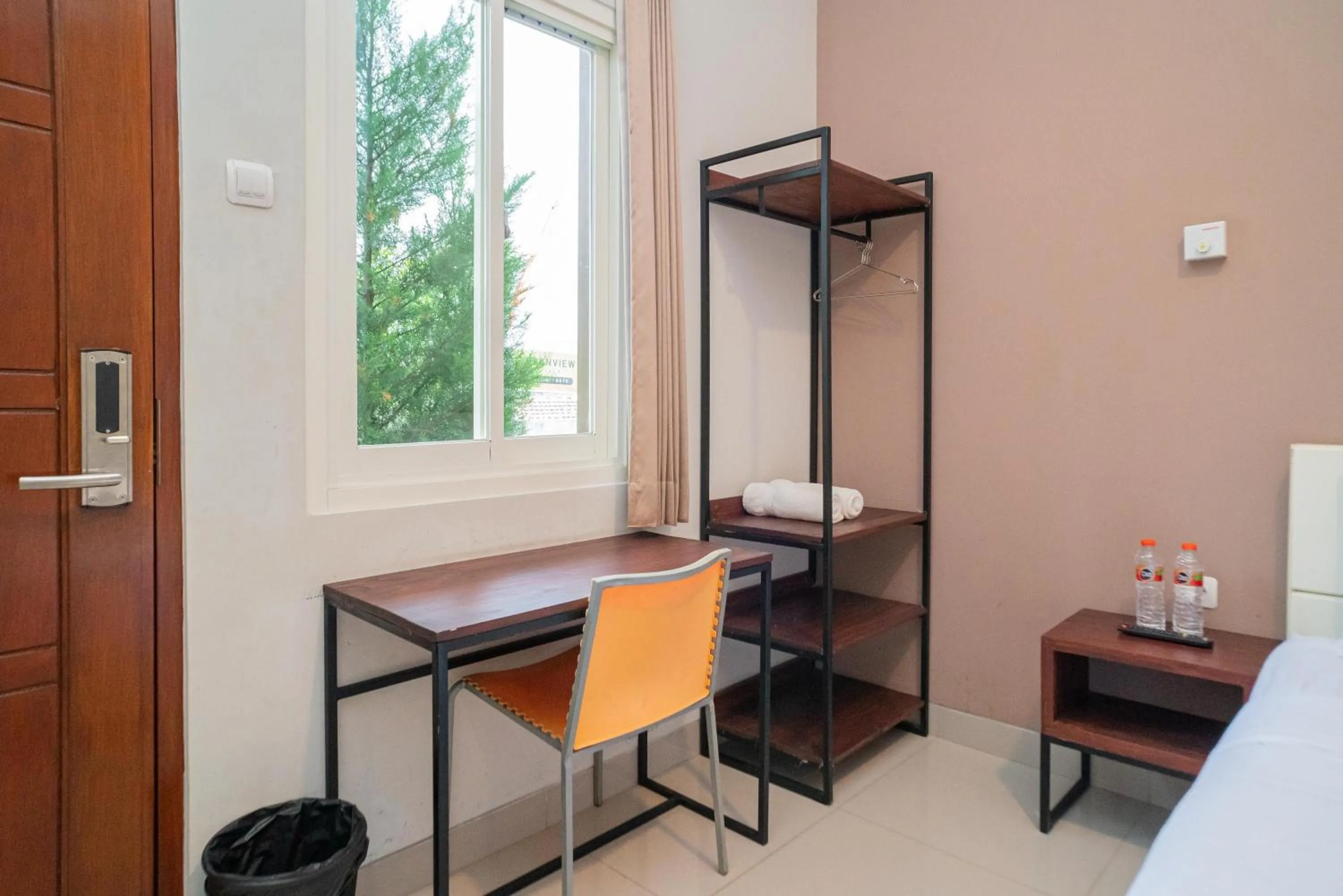 Bedroom, Bed in Urbanview Hotel Bubusini Batu by RedDoorz