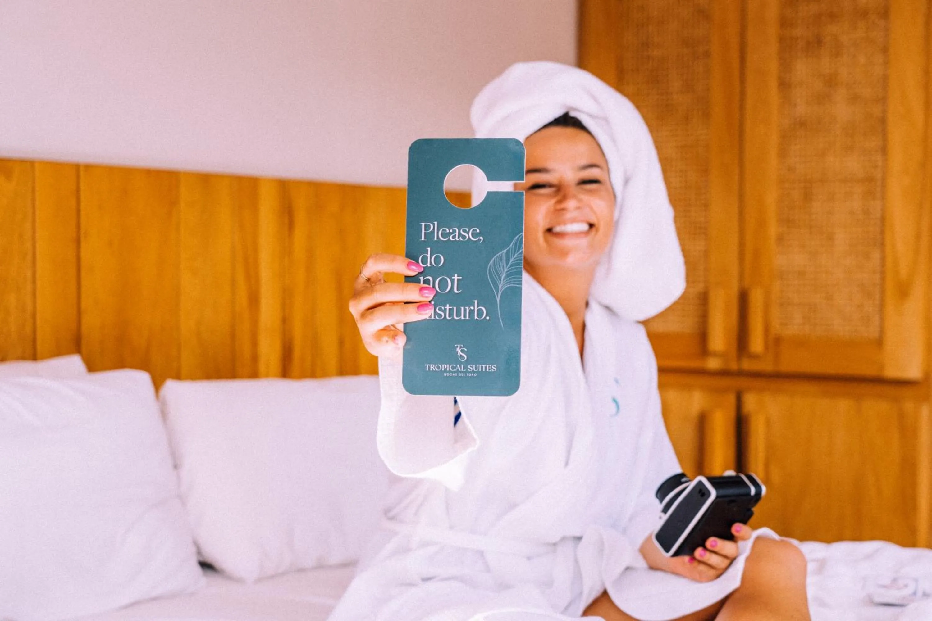 People, Bed in Tropical Suites Hotel