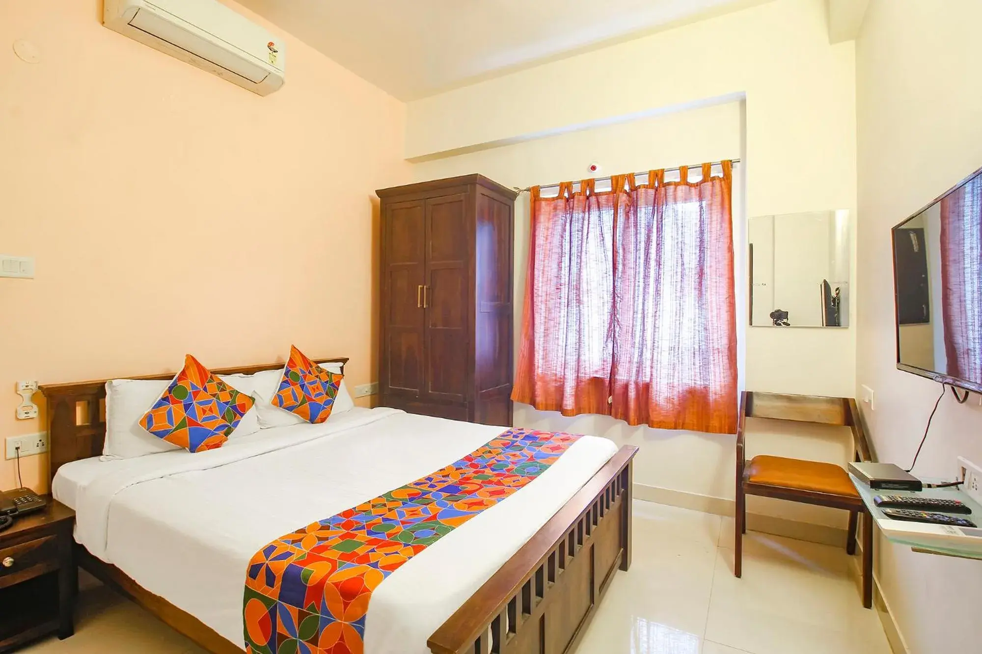 Communal lounge/ TV room, Bed in FabHotel Corner Courtyard - Nr Botanical Garden, Kondapur Communal lounge/ TV room, Bed in FabHotel Corner Courtyard - Nr Botanical Garden, Kondapur