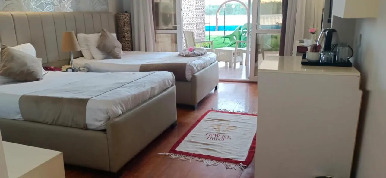 Bed in Jewel Maadi Cabins and Club