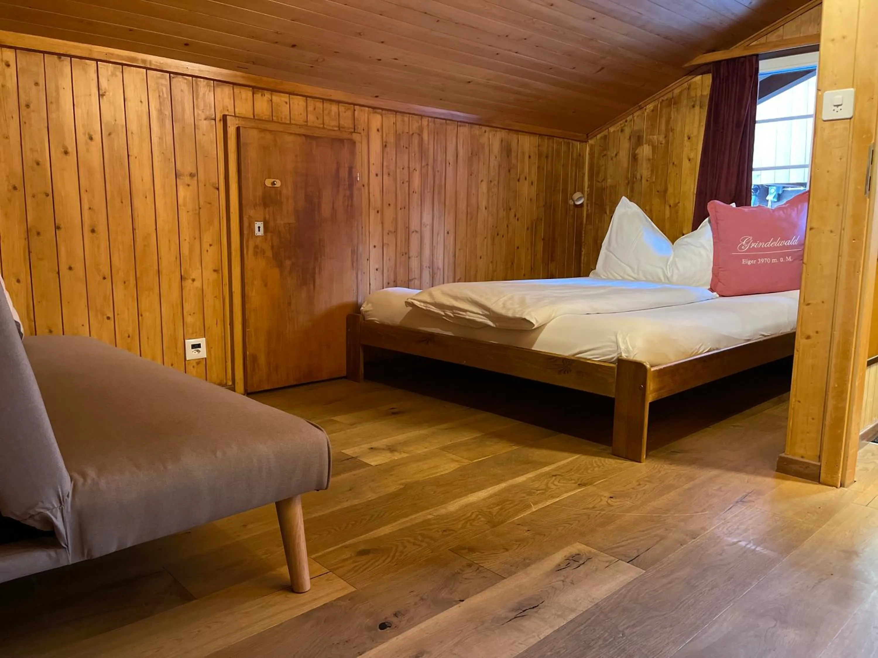 Bed in Hotel Jägerstübli Grindelwald