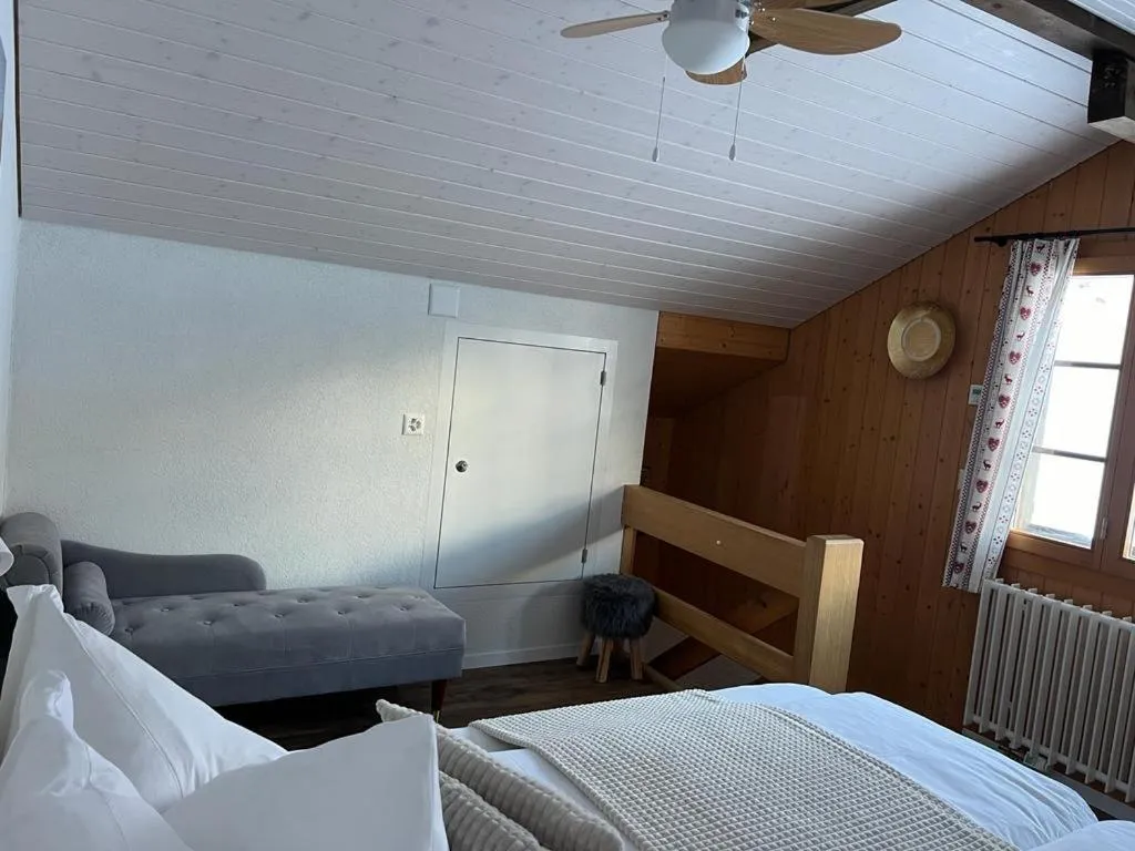 Bed in Hotel Jägerstübli Grindelwald