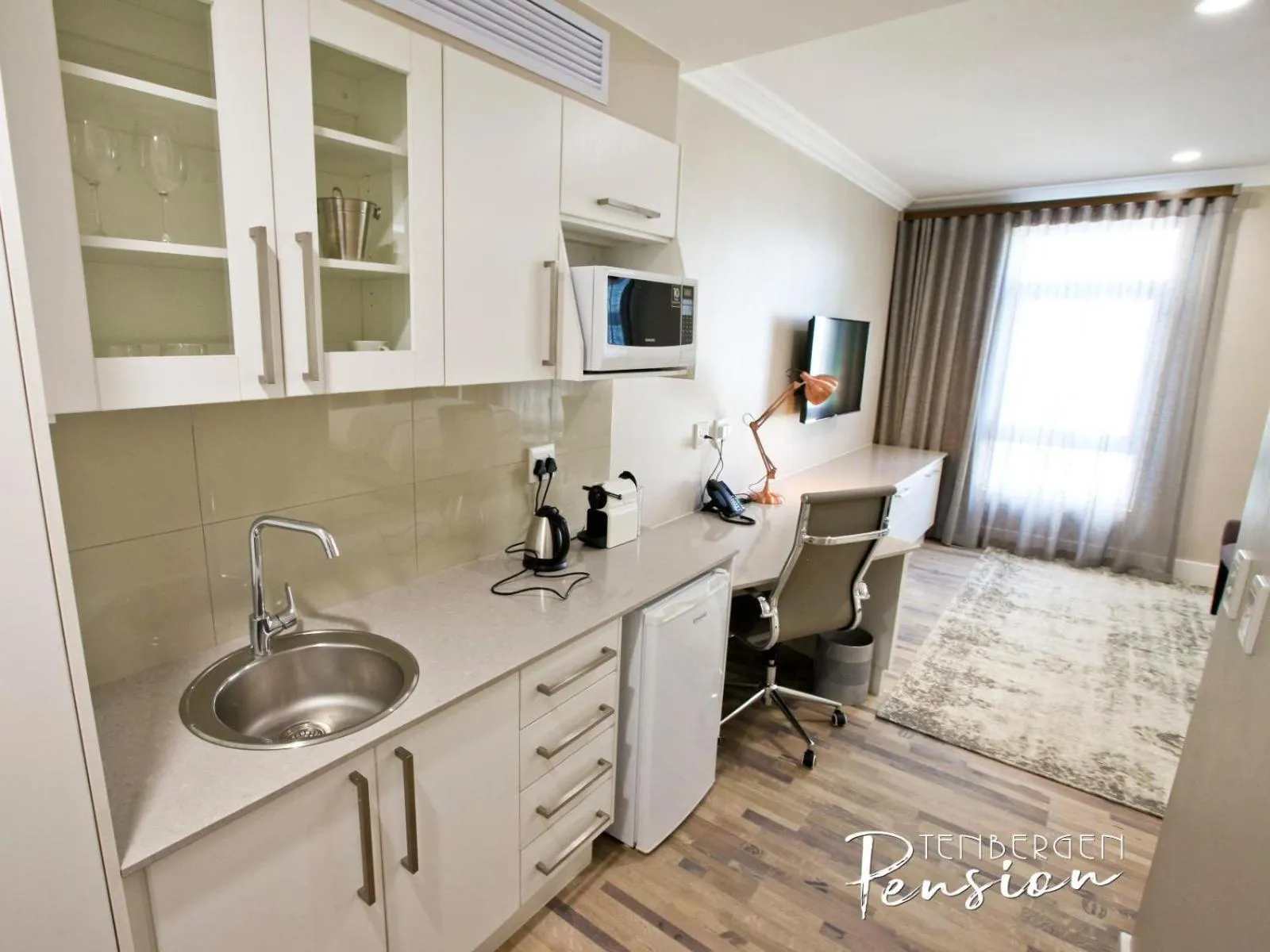 Kitchen or kitchenette in Tenbergen Pension Hotel