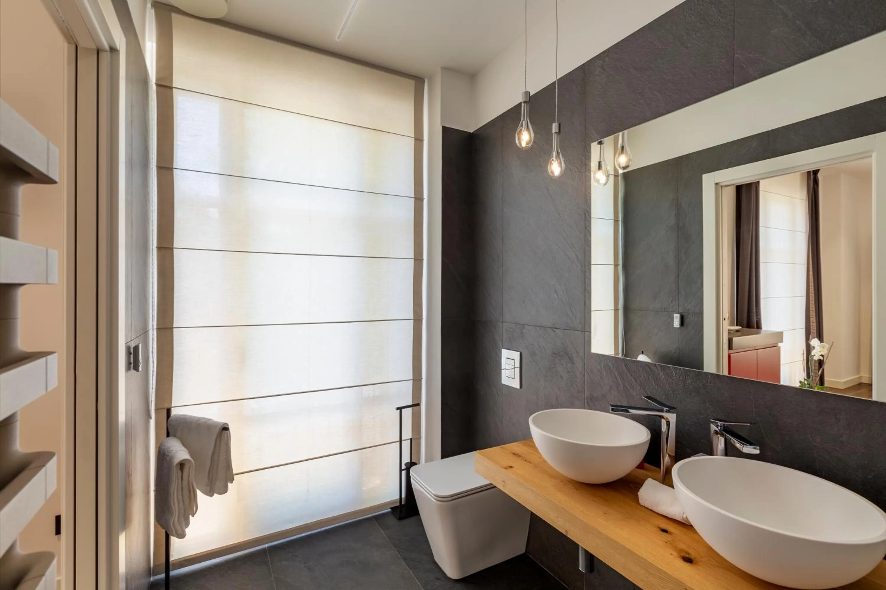 Bathroom in Qui Vicino boutique rooms and suites