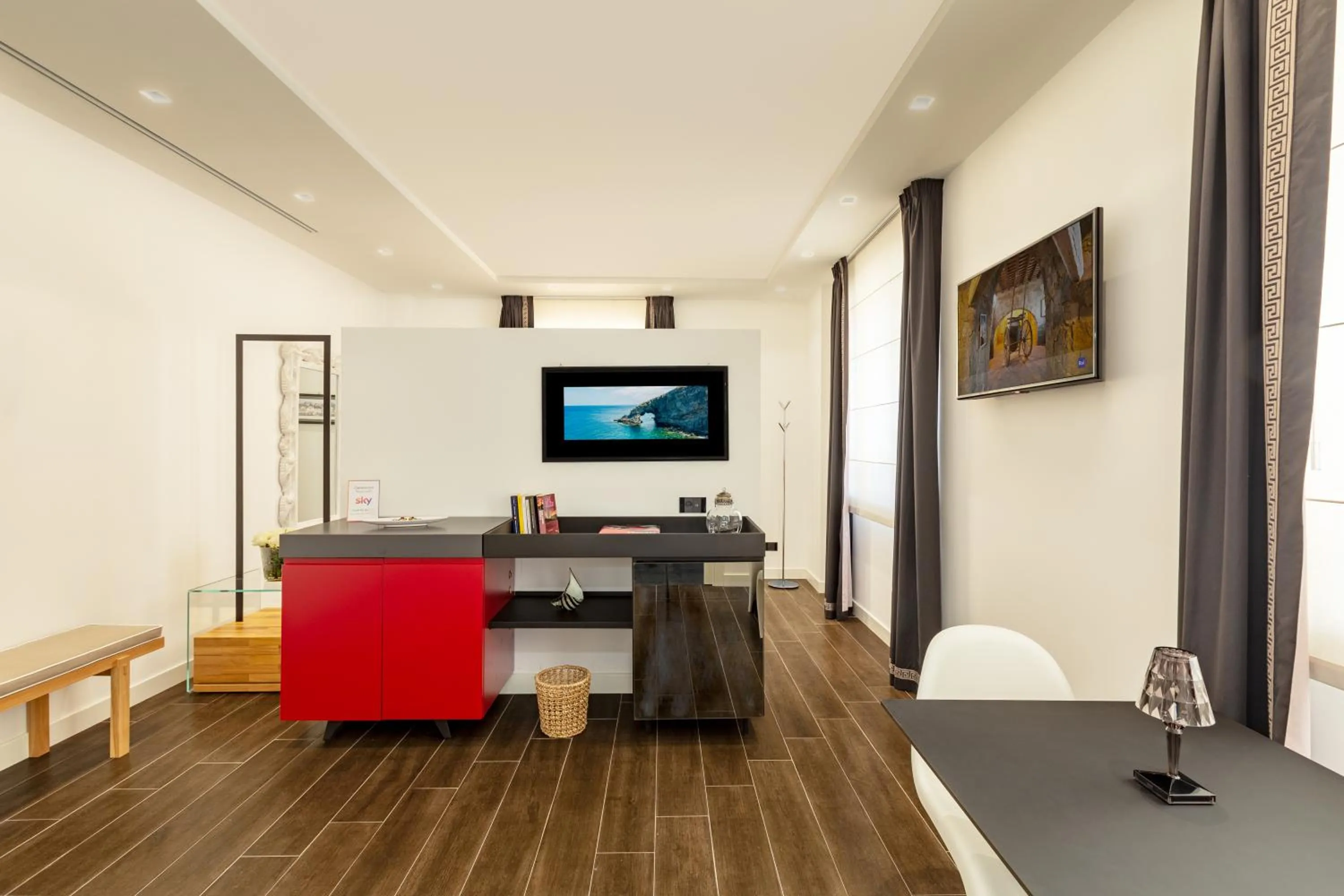 Seating area in Qui Vicino boutique rooms and suites