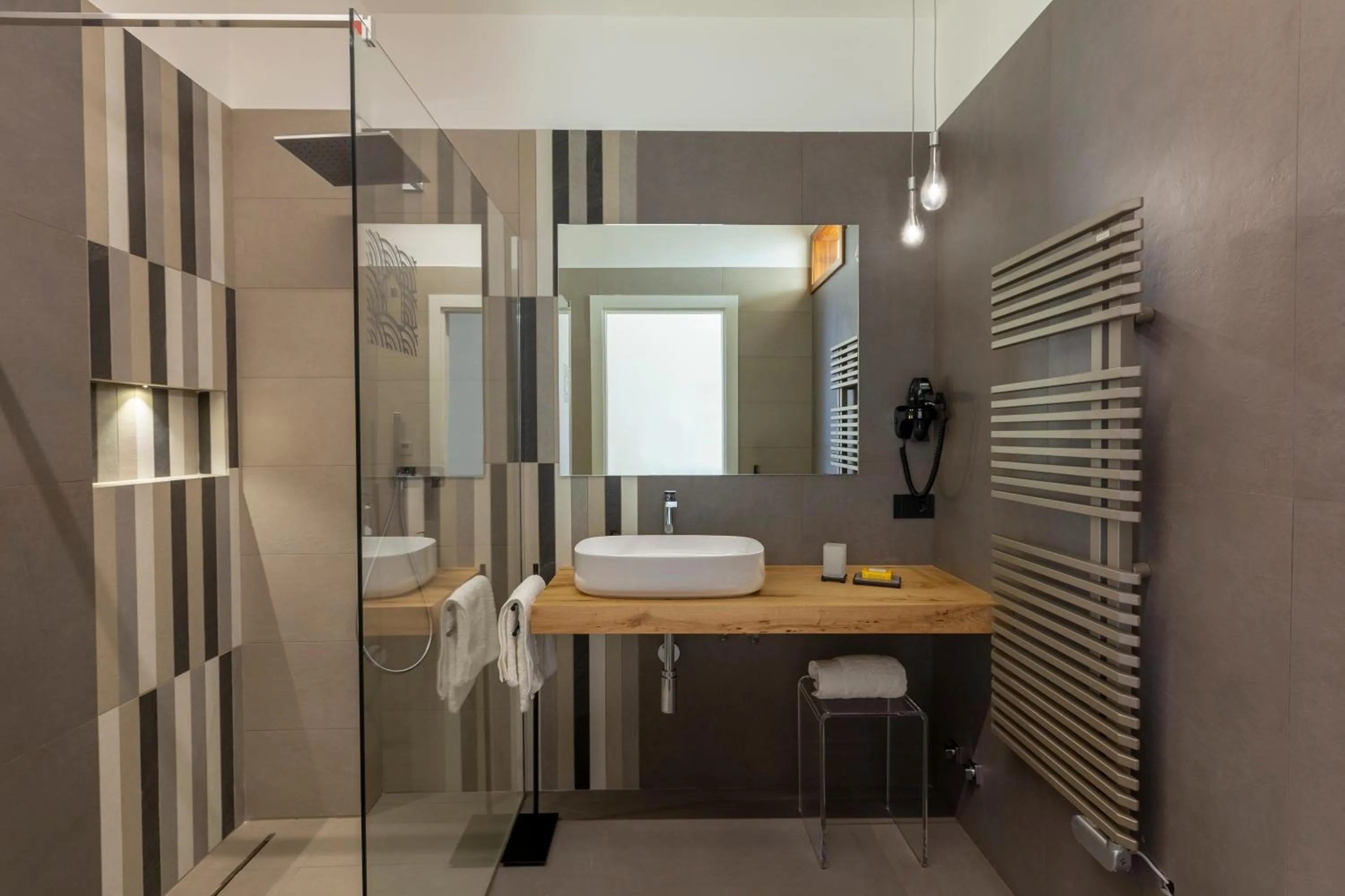 Bathroom in Qui Vicino boutique rooms and suites