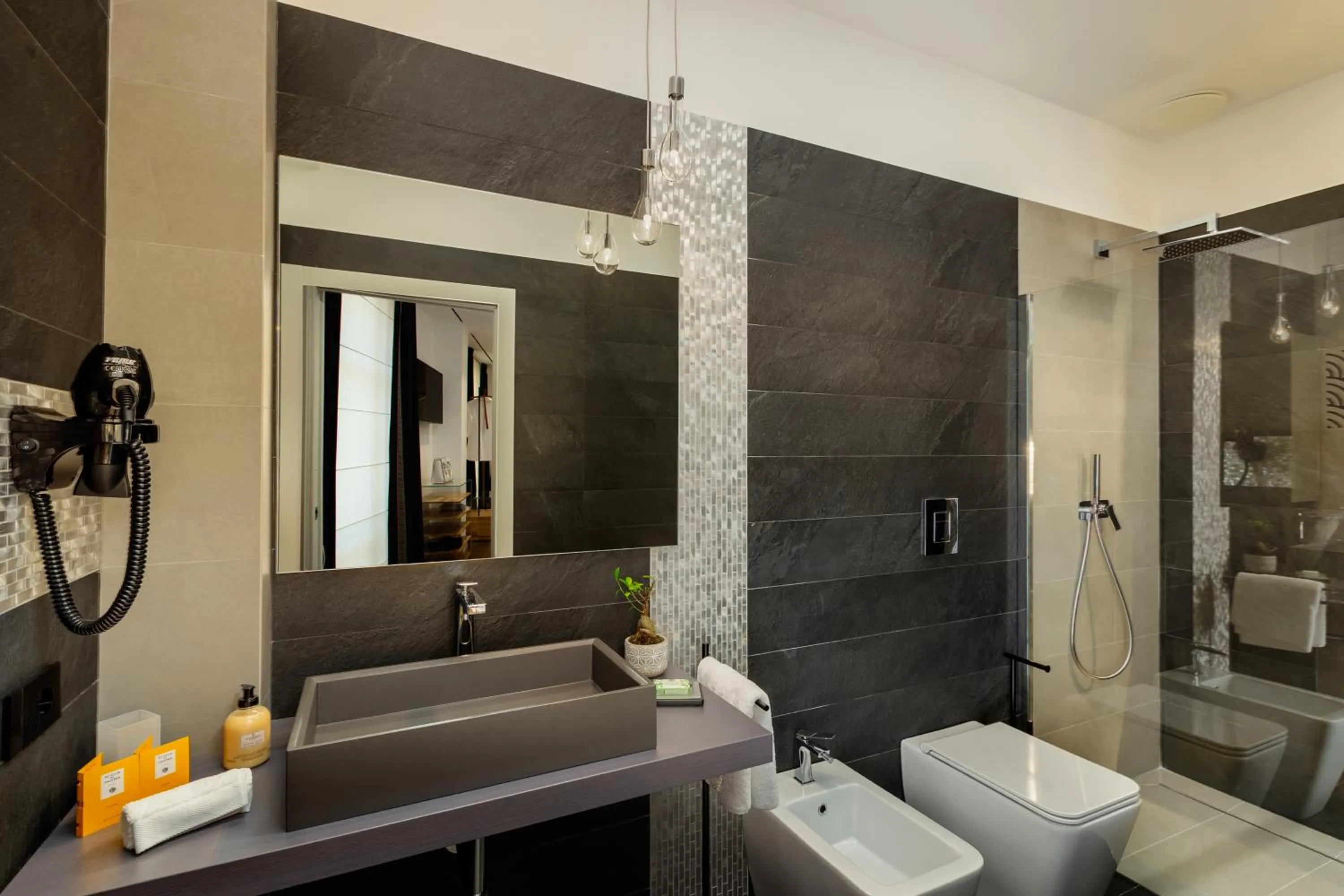 Bathroom in Qui Vicino boutique rooms and suites