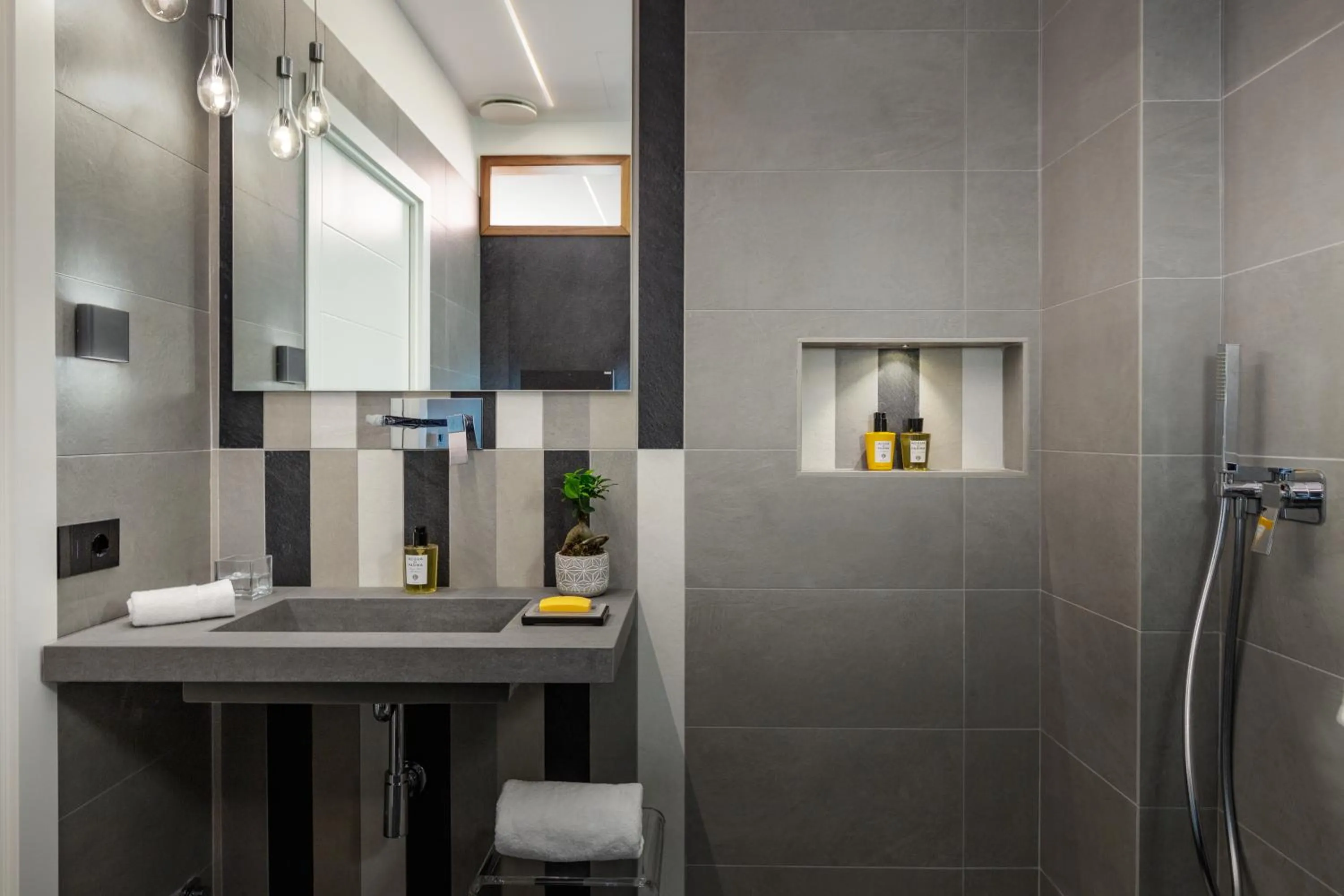 Bathroom in Qui Vicino boutique rooms and suites