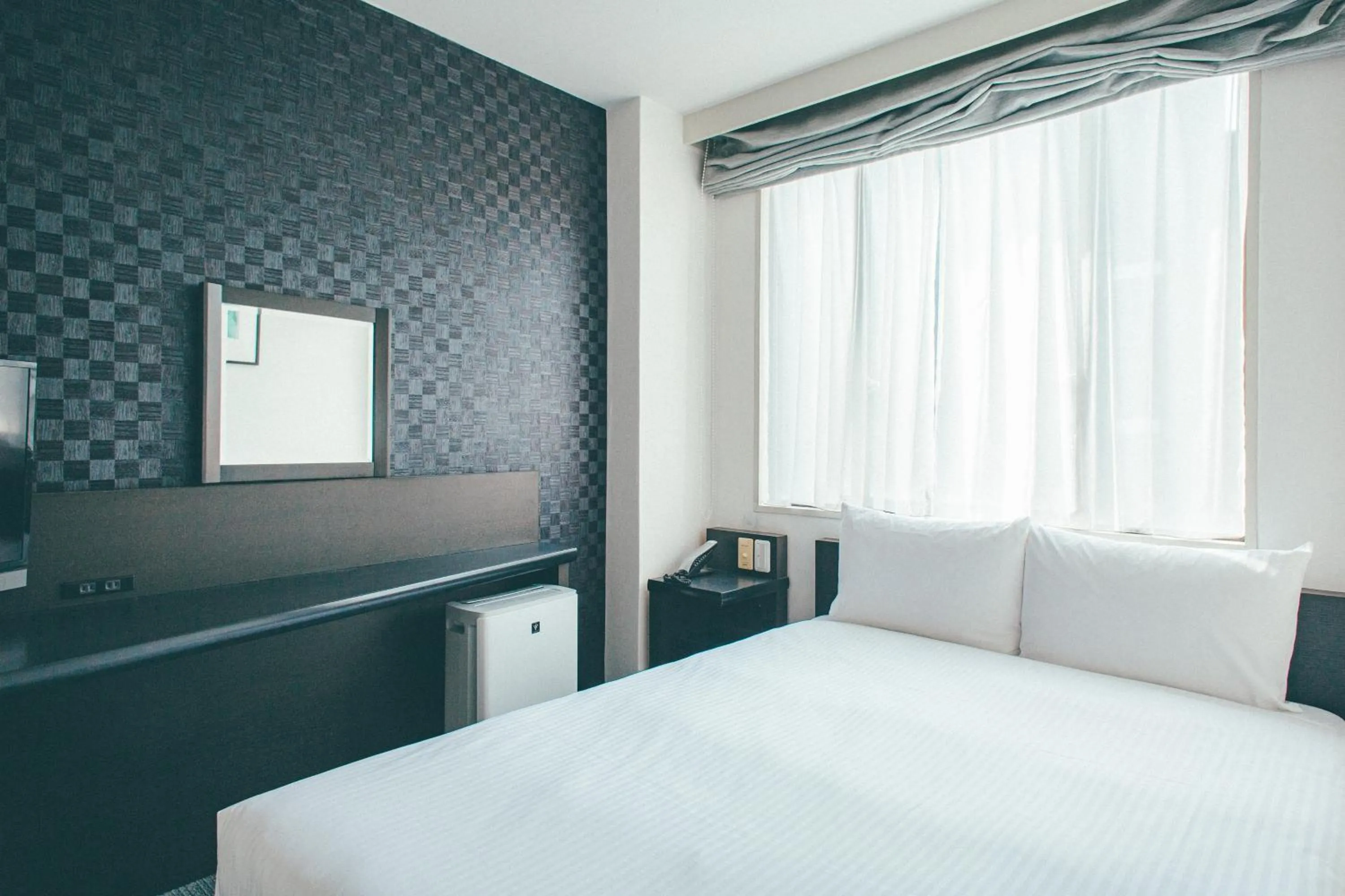 Bed in Hamilton Hotel Black