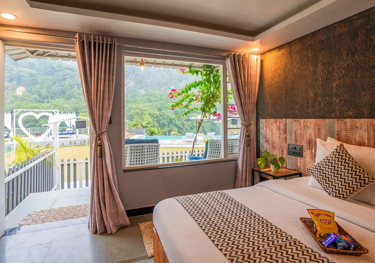 Garden view, Bed in Moustache Rishikesh Riverside Resort Garden view, Bed in Moustache Rishikesh Riverside Resort