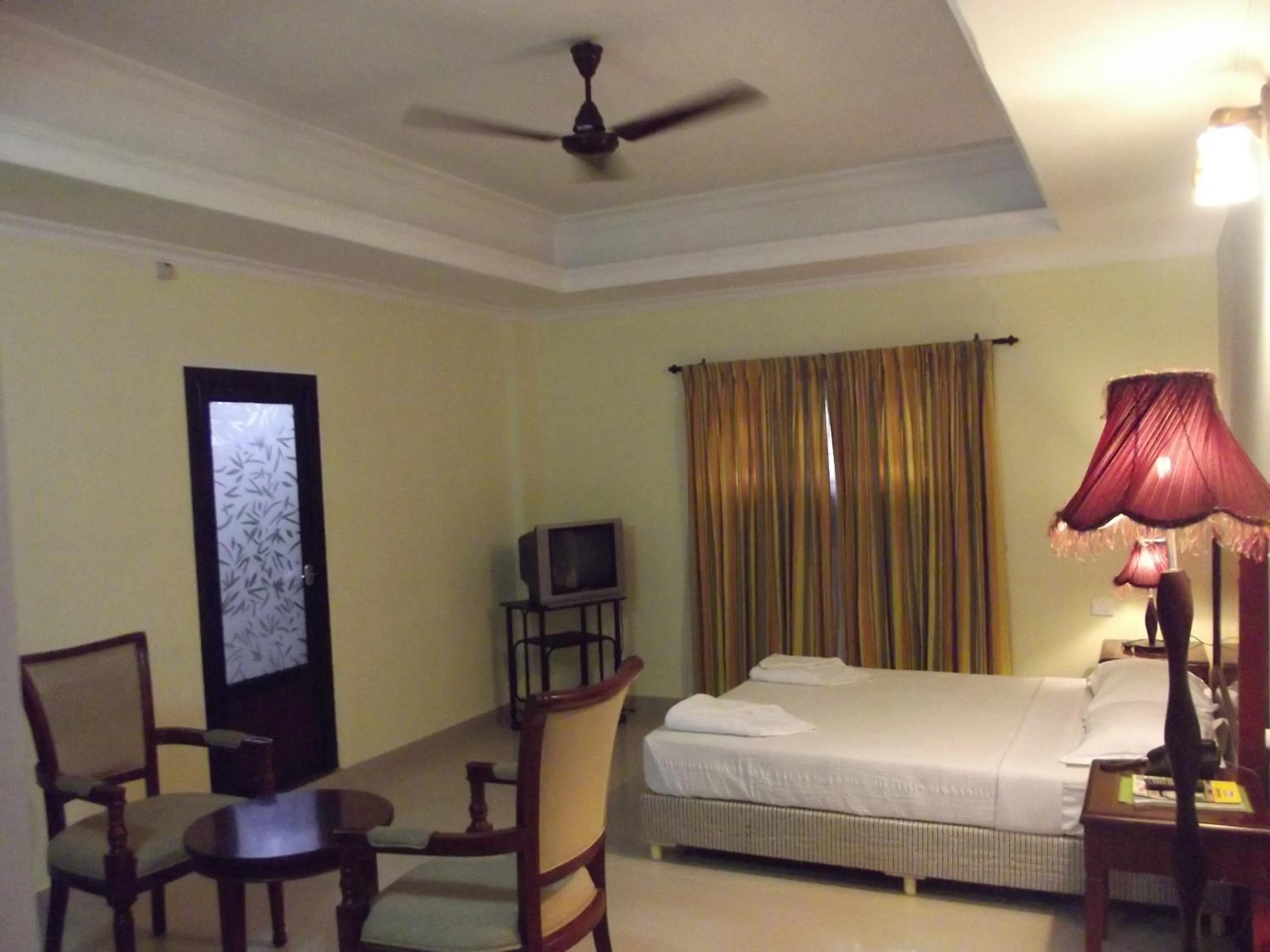 Bedroom, Bed in Devasura inn