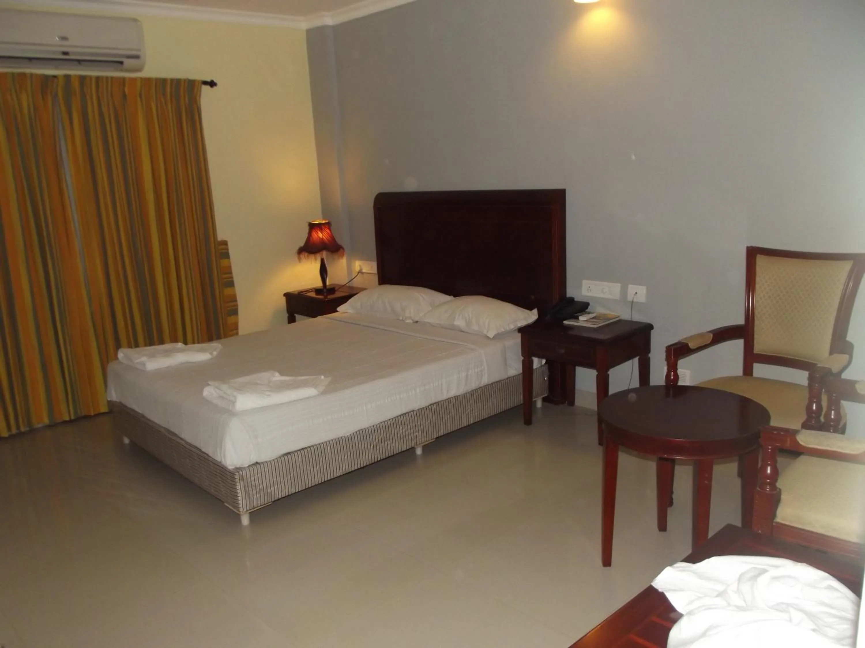 Photo of the whole room, Bed in Devasura inn