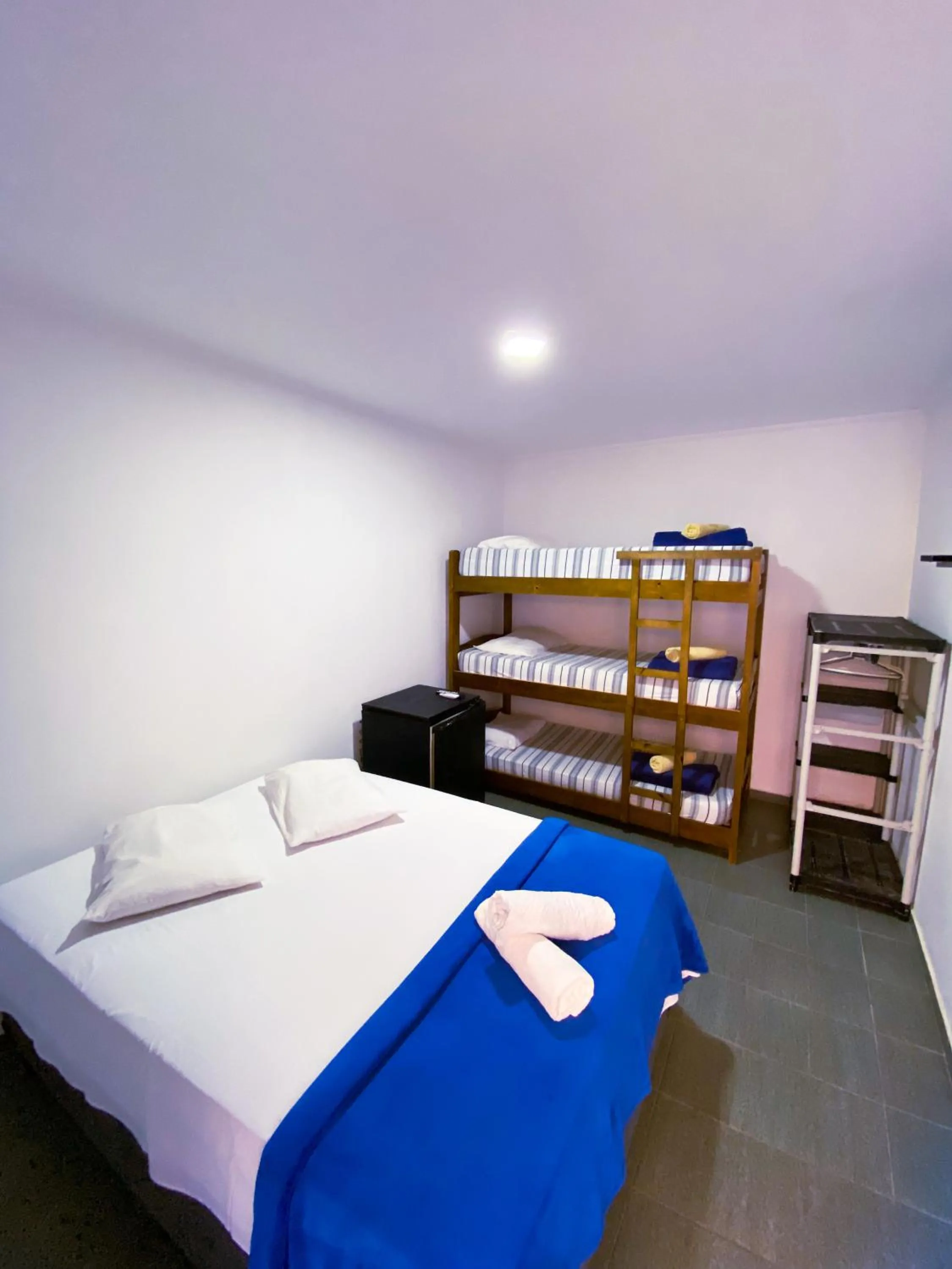 Bed in Pousada Praia do Tombo