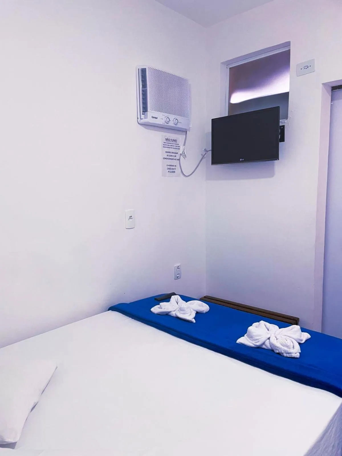 Bed in Pousada Praia do Tombo