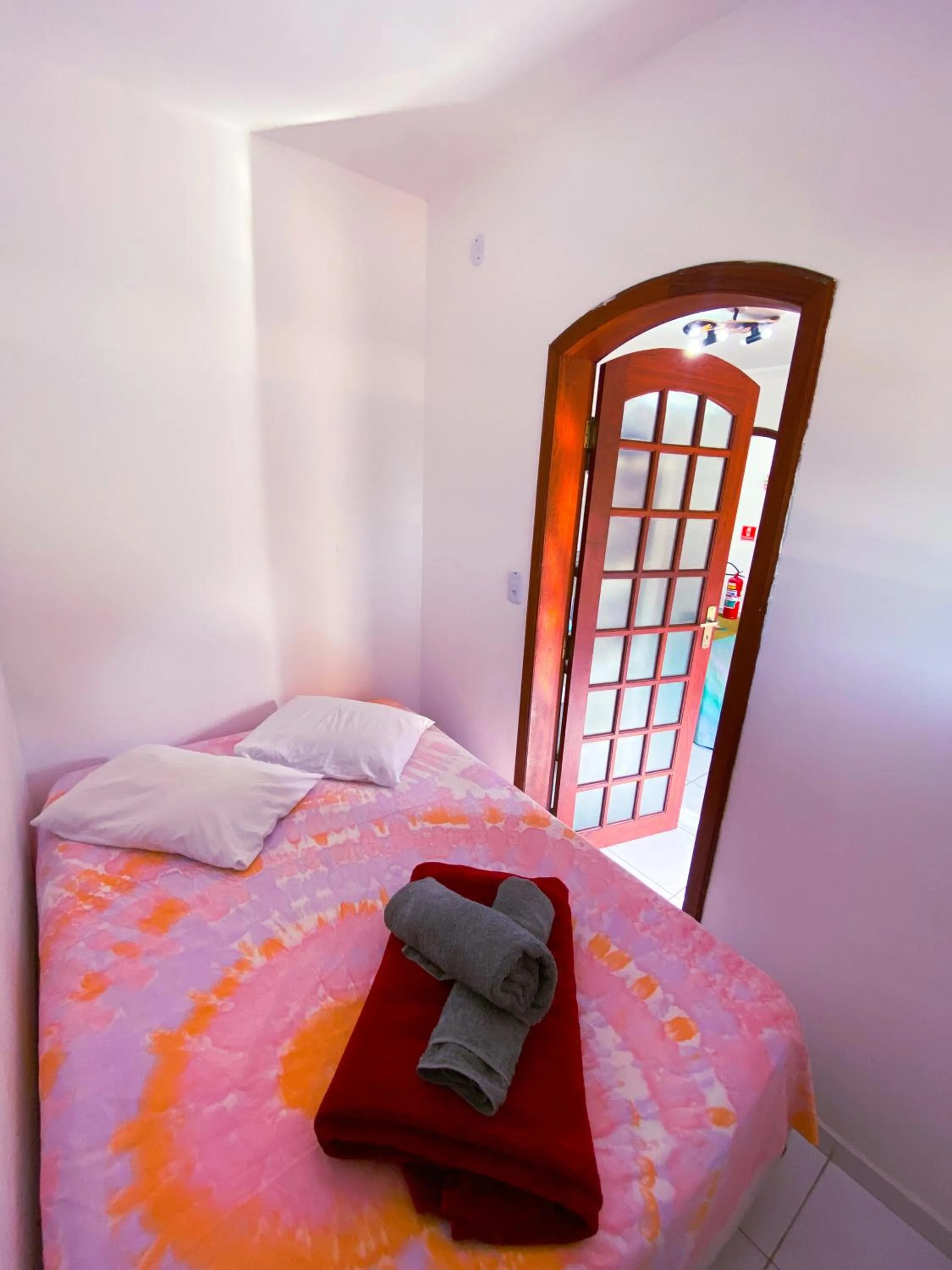 Bed in Pousada Praia do Tombo